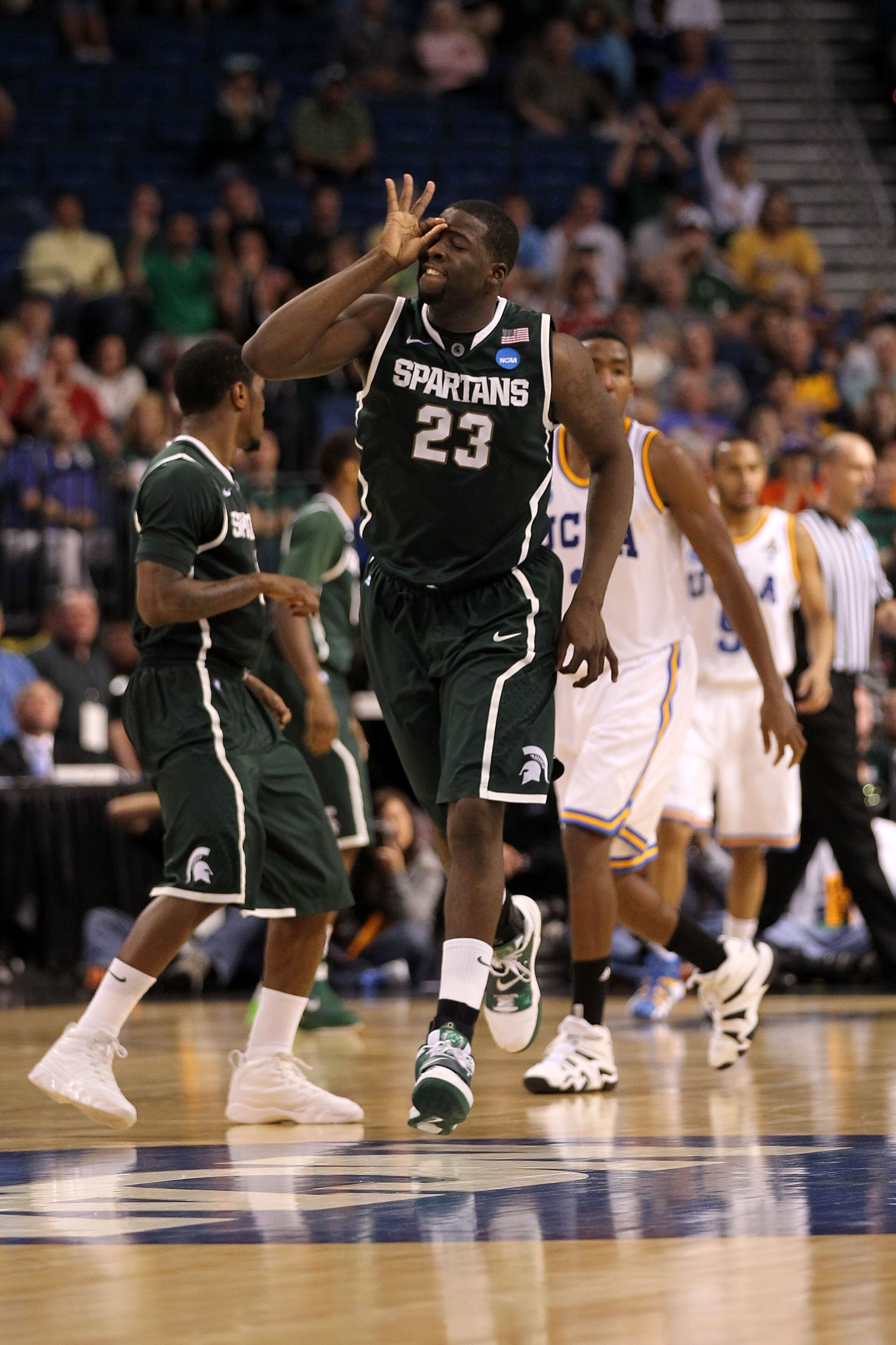 TAMPA, FL - MARCH 17:  Draymond Green #23 of the Michigan State Spartans reacts after he made a 3-point shot in the second half against the UCLA Bruins during the second round of the 2011 NCAA men's basketball tournament at St. Pete Times Forum on March 1