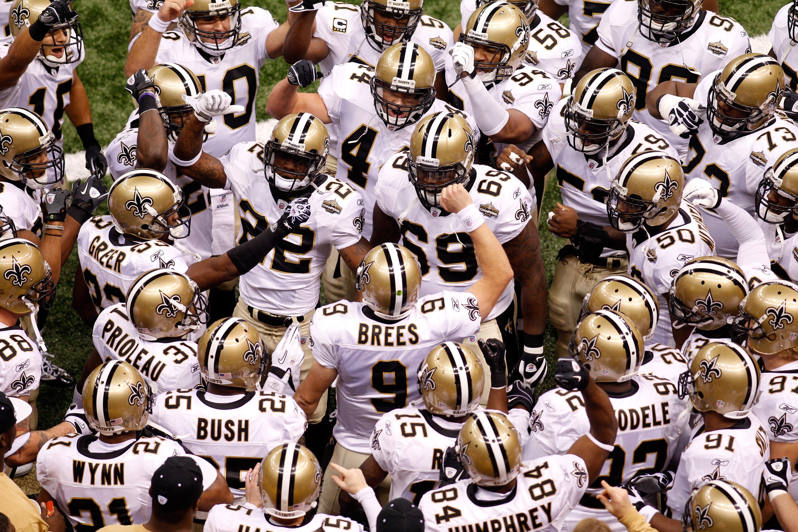 NEW ORLEANS - SEPTEMBER 09:  Drew Brees #9 of the New Orleans Saints leads his team in a chant as they huddle up prior to playing the Minnesota Vikings at Louisiana Superdome on September 9, 2010 in New Orleans, Louisiana.  (Photo by Chris Graythen/Getty