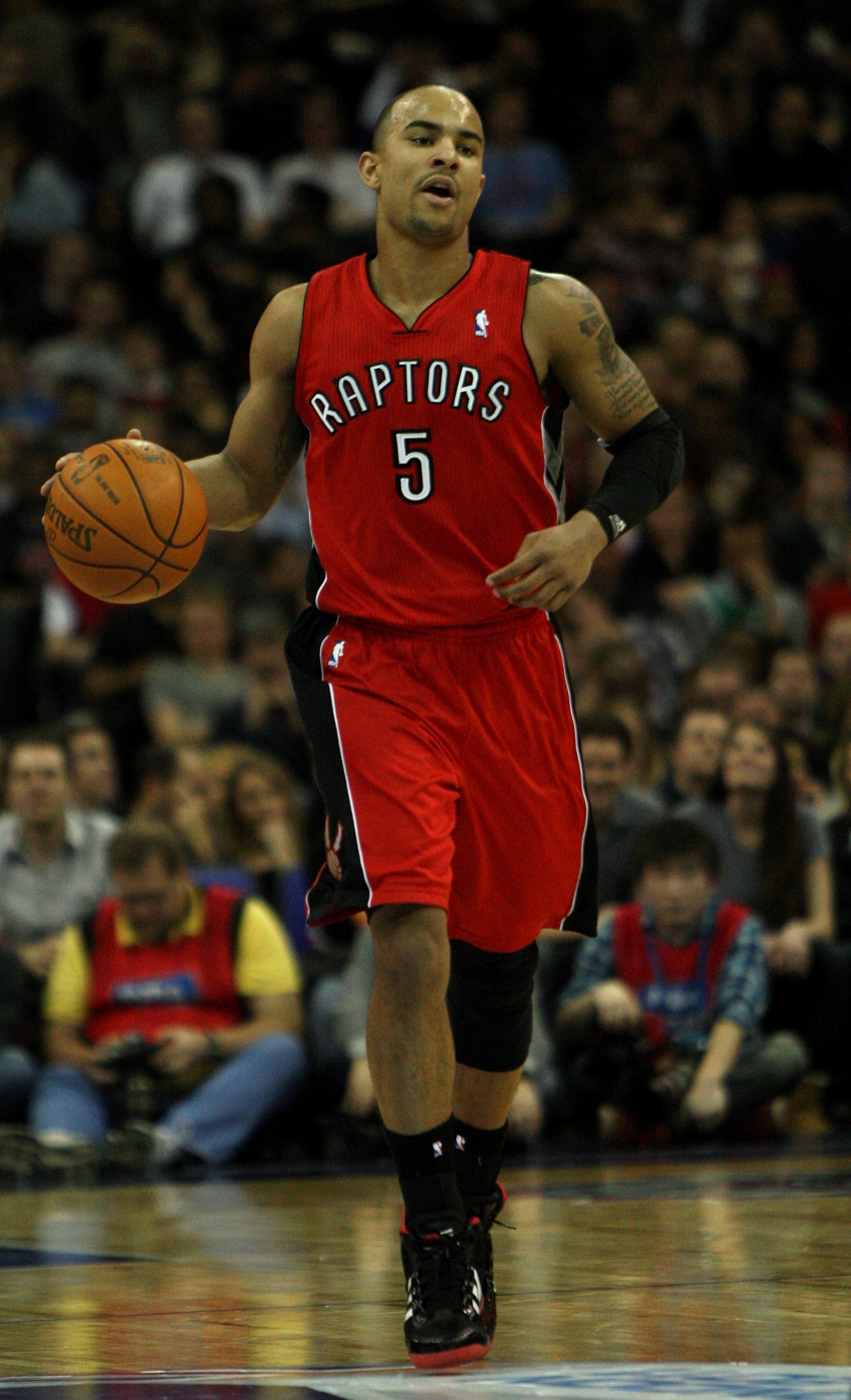 LONDON, ENGLAND - MARCH 04:  #5 Jerryd Bayless of the Raptors in action during the NBA match between New Jersey Nets and the Toronto Raptors at the O2 Arena on March 4, 2011 in London, England. NOTE TO USER: User expressly acknowledges and agrees that, by