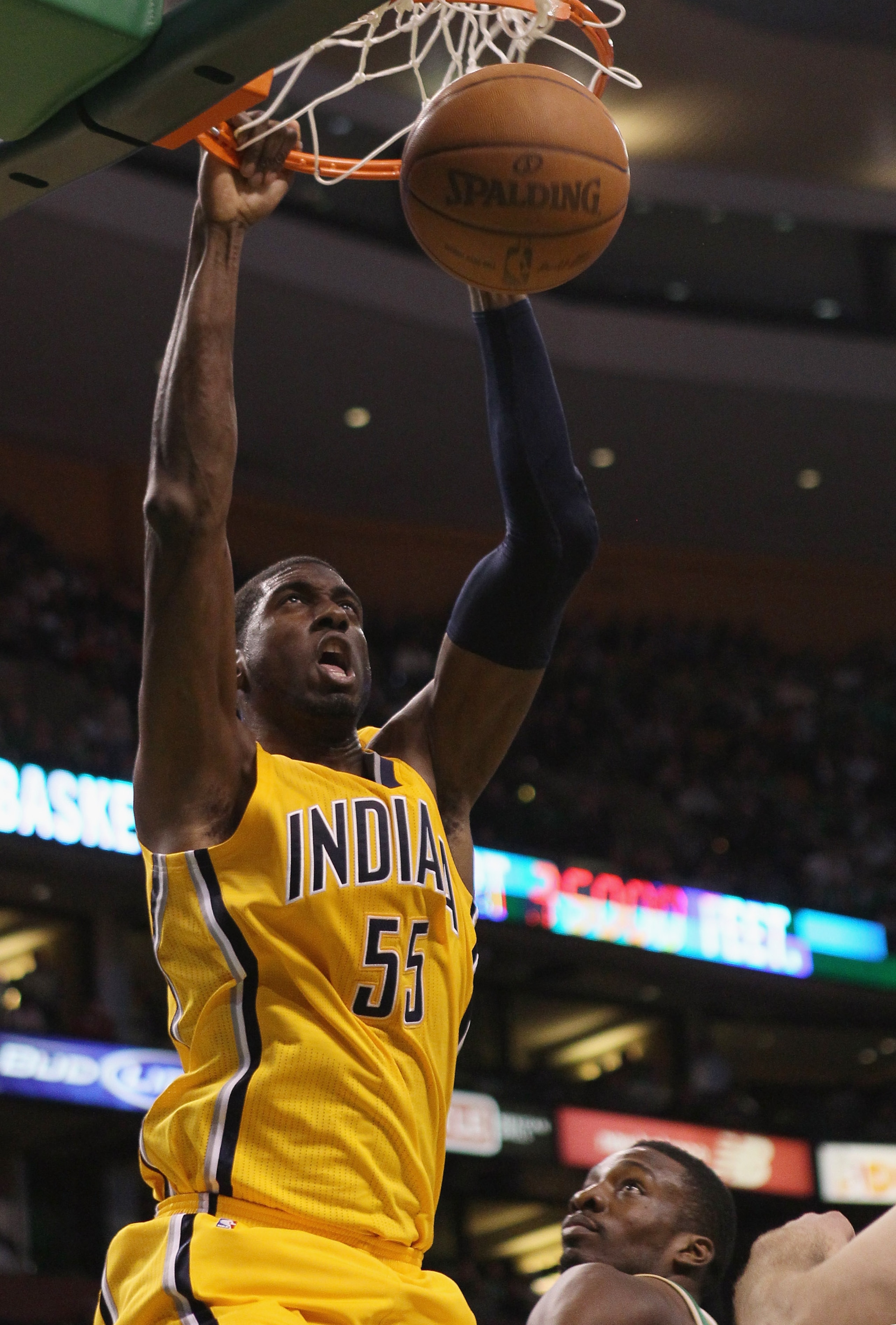 BOSTON, MA - MARCH 16:  Roy Hibbert #55 of the Indiana Pacers dunks the ball over Jeff Green #8 of the Boston Celtics on March 16, 2011 at the TD Garden in Boston, Massachusetts. The Celtics defeated the Indiana Pacers 92-80. NOTE TO USER: User expressly