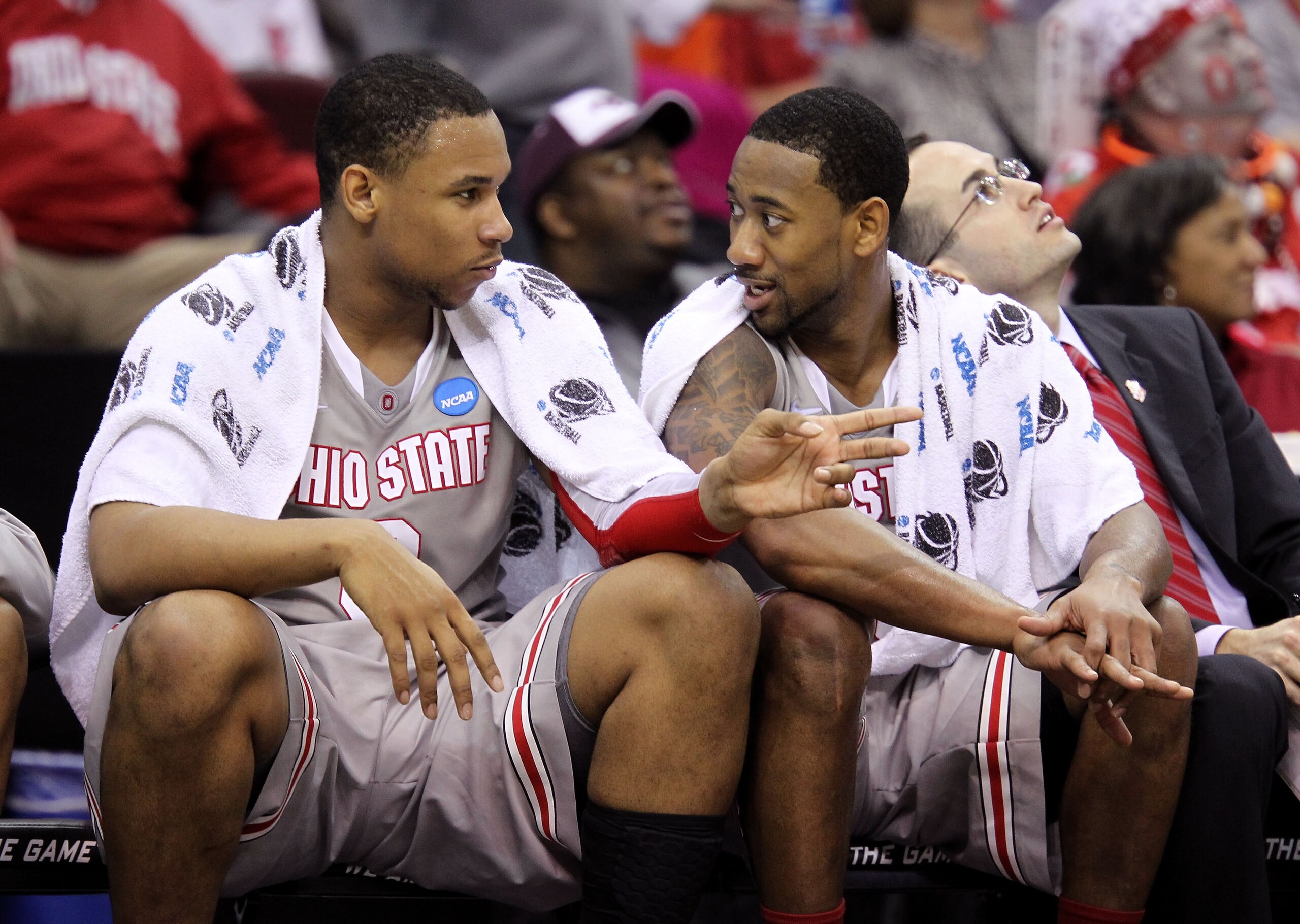 CLEVELAND, OH - MARCH 20:  Jared Sullinger #0 and David Lighty #23 of the Ohio State Buckeyes talk on the bench during the second half against the George Mason Patriots during the third of the 2011 NCAA men's basketball tournament at Quicken Loans Arena o