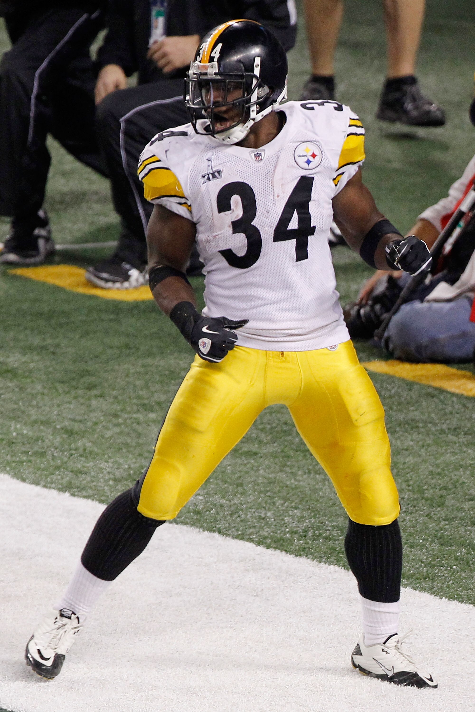 ARLINGTON, TX - FEBRUARY 06:  Rashard Mendenhall #34 of the Pittsburgh Steelers celebrates after running for an eight yard touchdown against the Green Bay Packers in the third quarter of Super Bowl XLV at Cowboys Stadium on February 6, 2011 in Arlington,