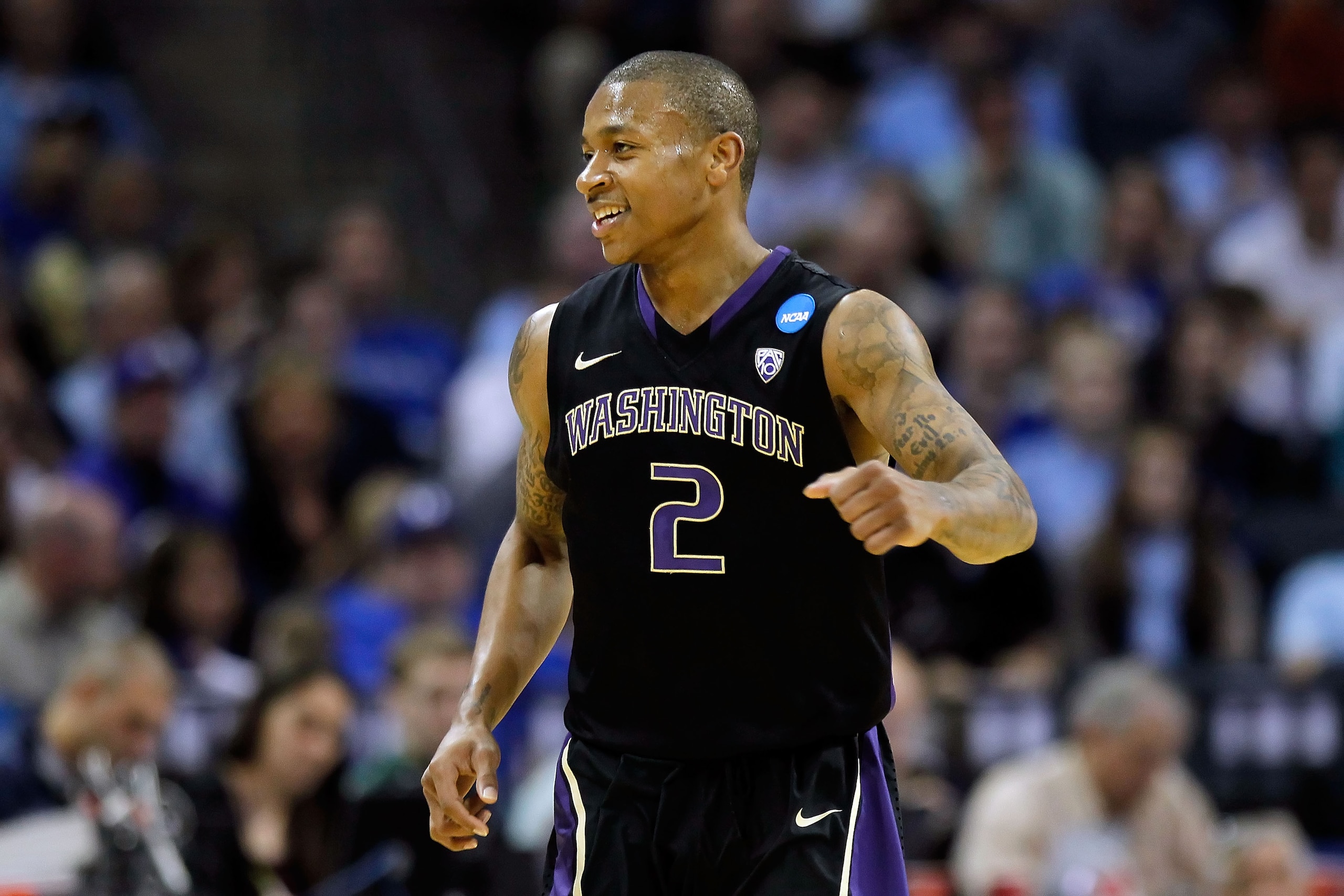 CHARLOTTE, NC - MARCH 20:  Isaiah Thomas #2 of the Washington Huskies reacts in the second half while taking on the North Carolina Tar Heels during the third round of the 2011 NCAA men's basketball tournament at Time Warner Cable Arena on March 20, 2011 i