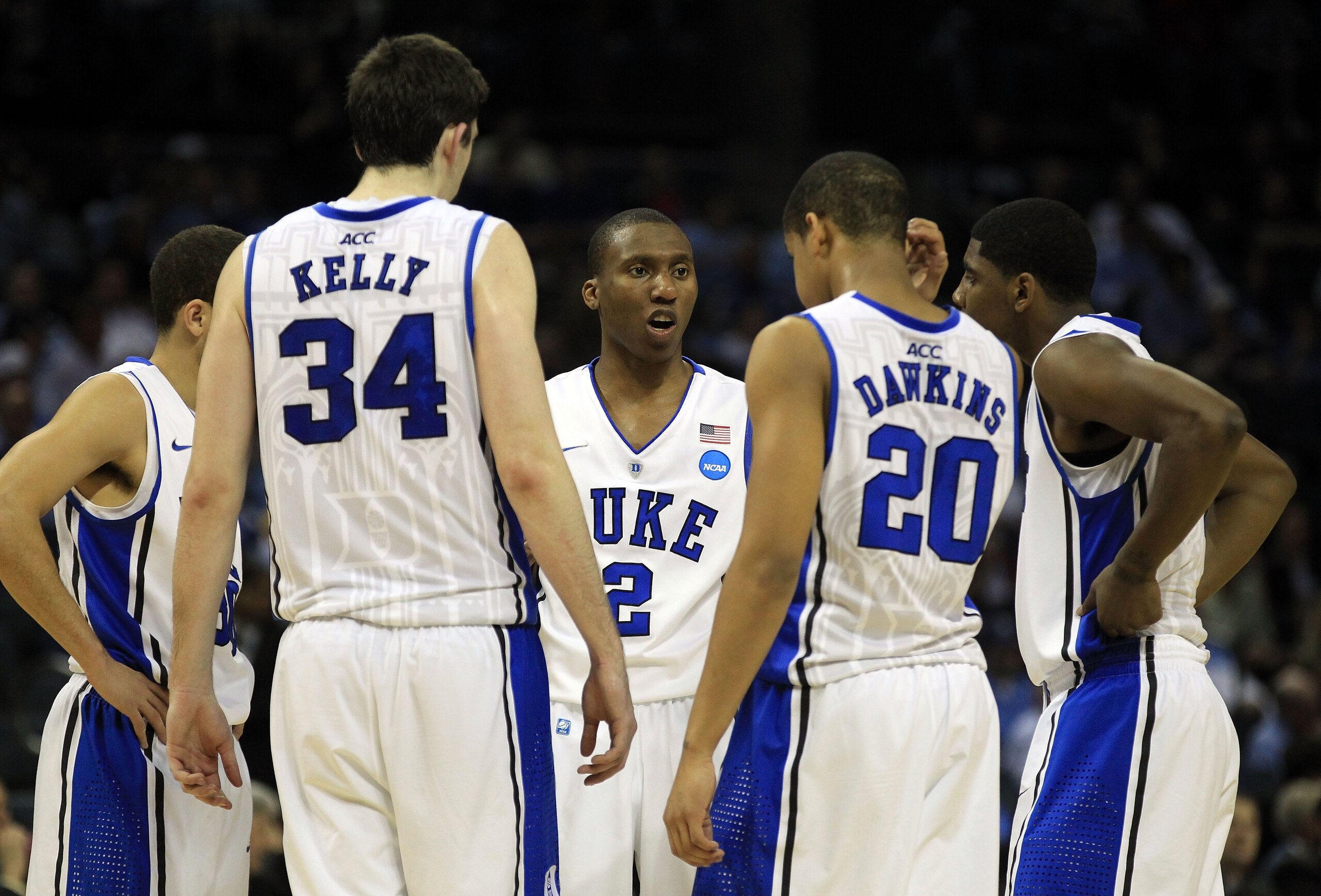 CHARLOTTE, NC - MARCH 20:  Nolan Smith #2 of the Duke Blue Devils talks with his teammates in the second half while taking on the Michigan Wolverines during the third round of the 2011 NCAA men's basketball tournament at Time Warner Cable Arena on March 2