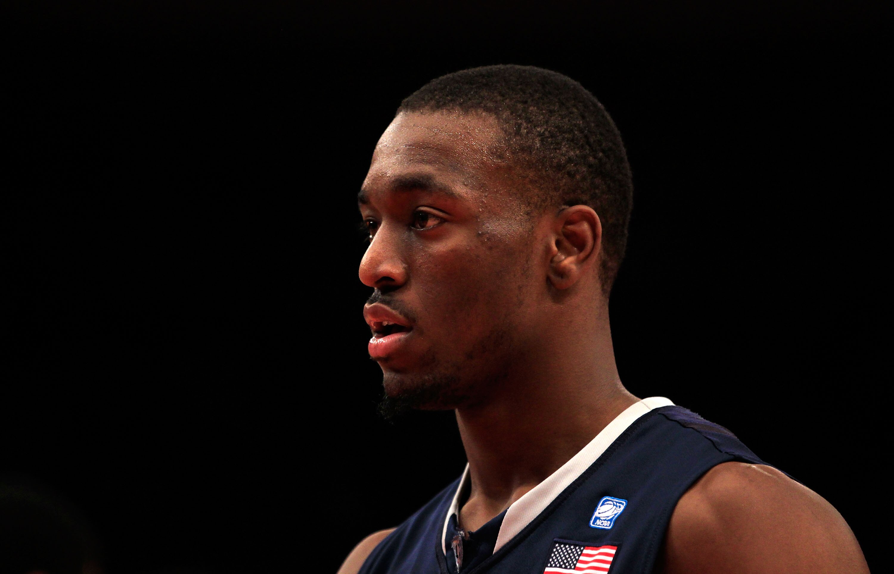 NEW YORK, NY - MARCH 12: Kemba Walker #15 of the Connecticut Huskies looks on during the game agaisnt the Louisville Cardinals during the championship of the 2011 Big East Men's Basketball Tournament presented by American Eagle Outfitters at Madison Squar