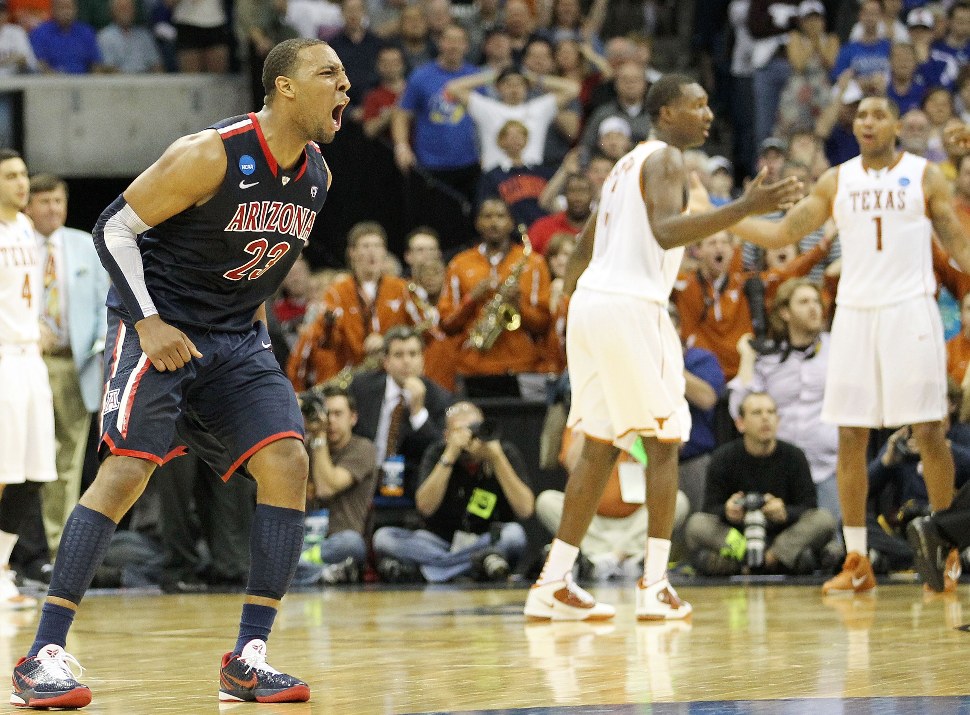 TULSA, OK - MARCH 20:  Derrick Williams #23 of the Arizona Wildcats celebrates after defeating the Texas Longhorns 70-69 in the third round of the 2011 NCAA men's basketball tournament at BOK Center on March 20, 2011 in Tulsa, Oklahoma.  (Photo by Ronald
