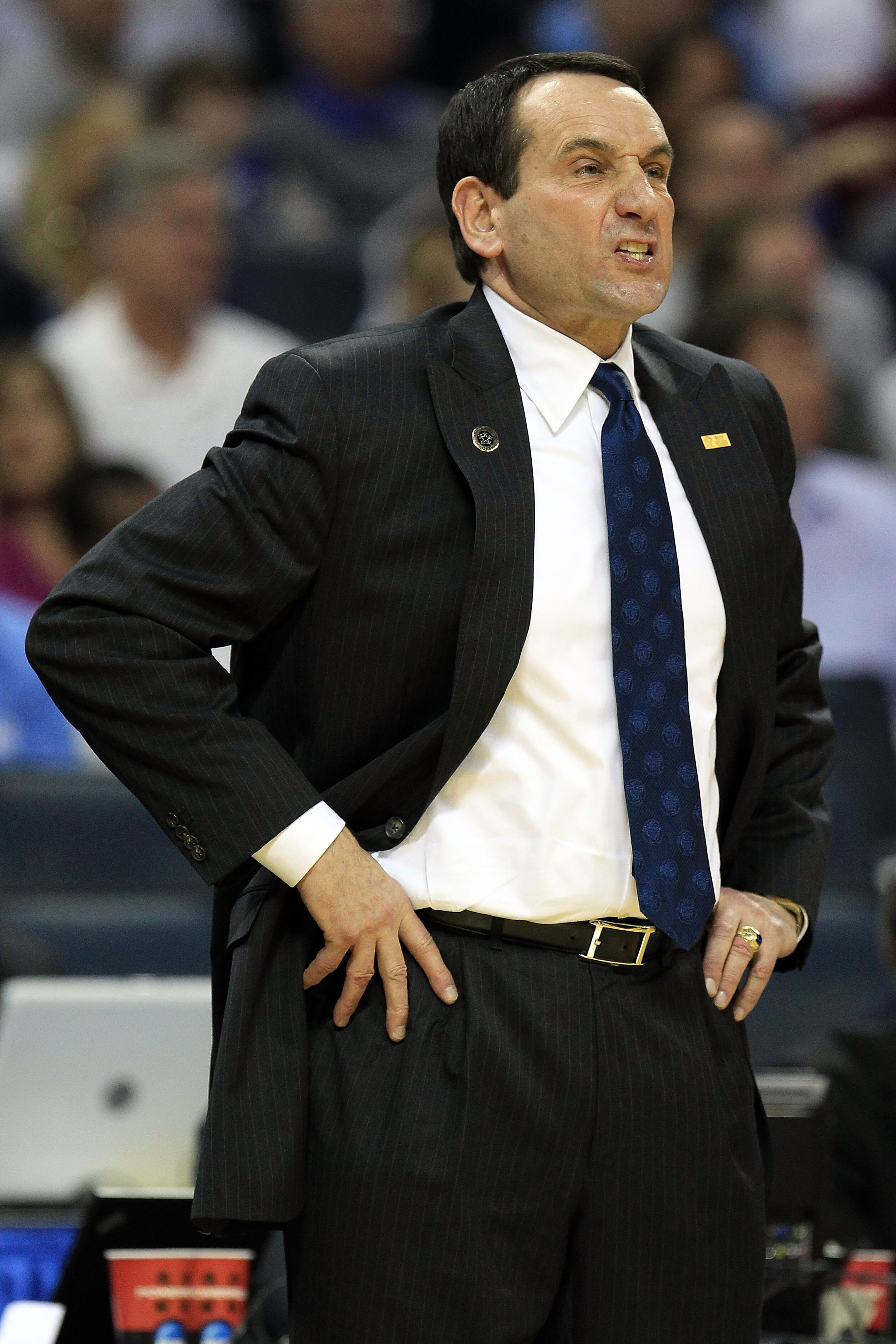 CHARLOTTE, NC - MARCH 20:  Head coach Mike Krzyzewski of the Duke Blue Devils looks on while taking on the Michigan Wolverines in the first half during the third round of the 2011 NCAA men's basketball tournament at Time Warner Cable Arena on March 20, 20