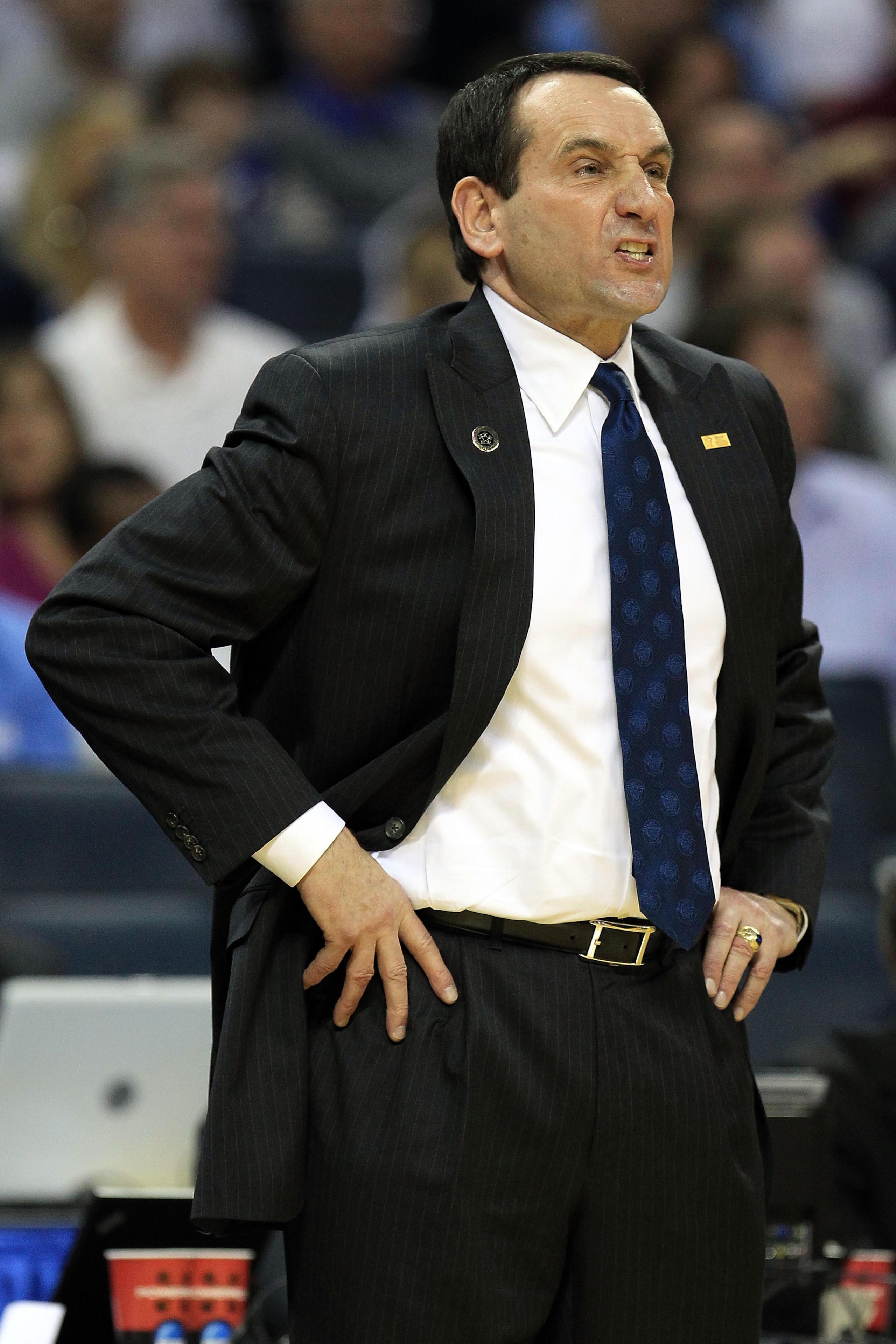 CHARLOTTE, NC - MARCH 20:  Head coach Mike Krzyzewski of the Duke Blue Devils looks on while taking on the Michigan Wolverines in the first half during the third round of the 2011 NCAA men's basketball tournament at Time Warner Cable Arena on March 20, 20