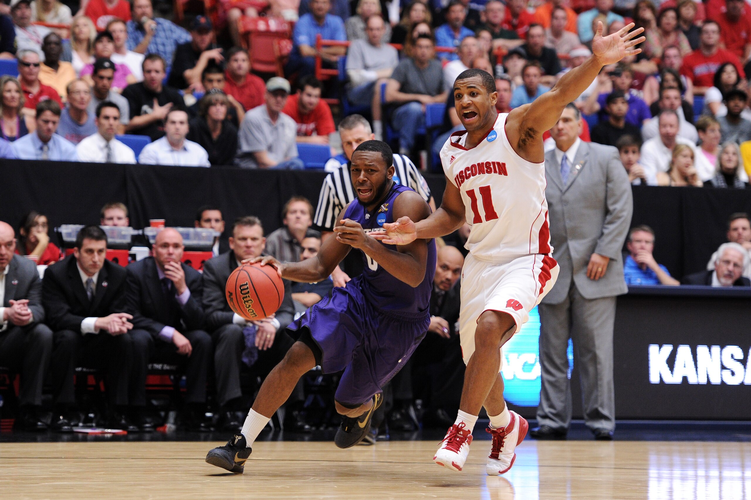 TUCSON, AZ - MARCH 19:  Jacob Pullen #0 of the Kansas State Wildcats drives against Jordan Taylor #11 of the Wisconsin Badgers during the third round of the 2011 NCAA men's basketball tournament at McKale Center on March 19, 2011 in Tucson, Arizona.  (Pho