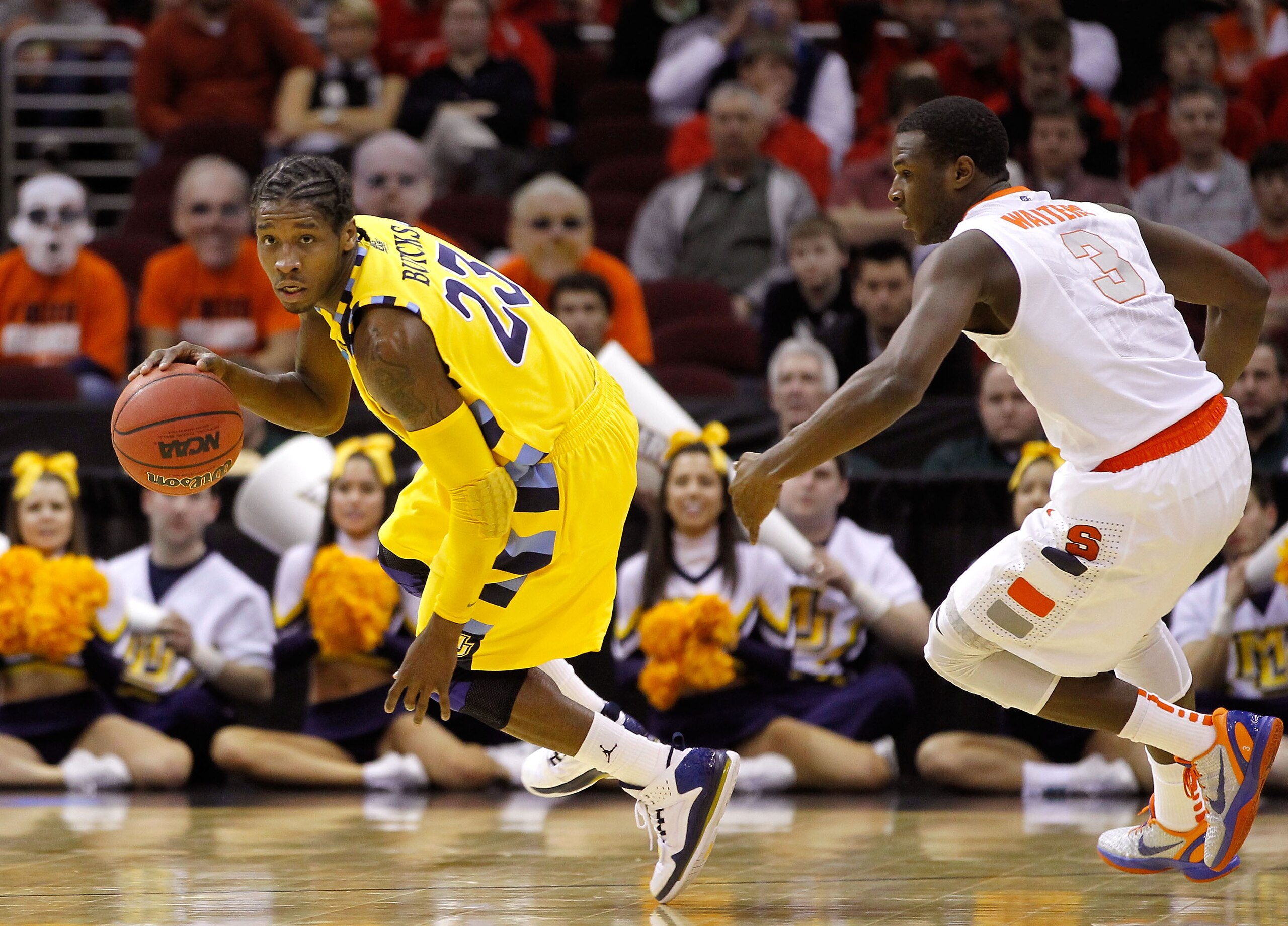 CLEVELAND, OH - MARCH 20: Dwight Buycks #23 of the Marquette Golden Eagles dribbles away from Dion Waiters #3 of the Syracuse Orange during the third of the 2011 NCAA men's basketball tournament at Quicken Loans Arena on March 20, 2011 in Cleveland, Ohio.