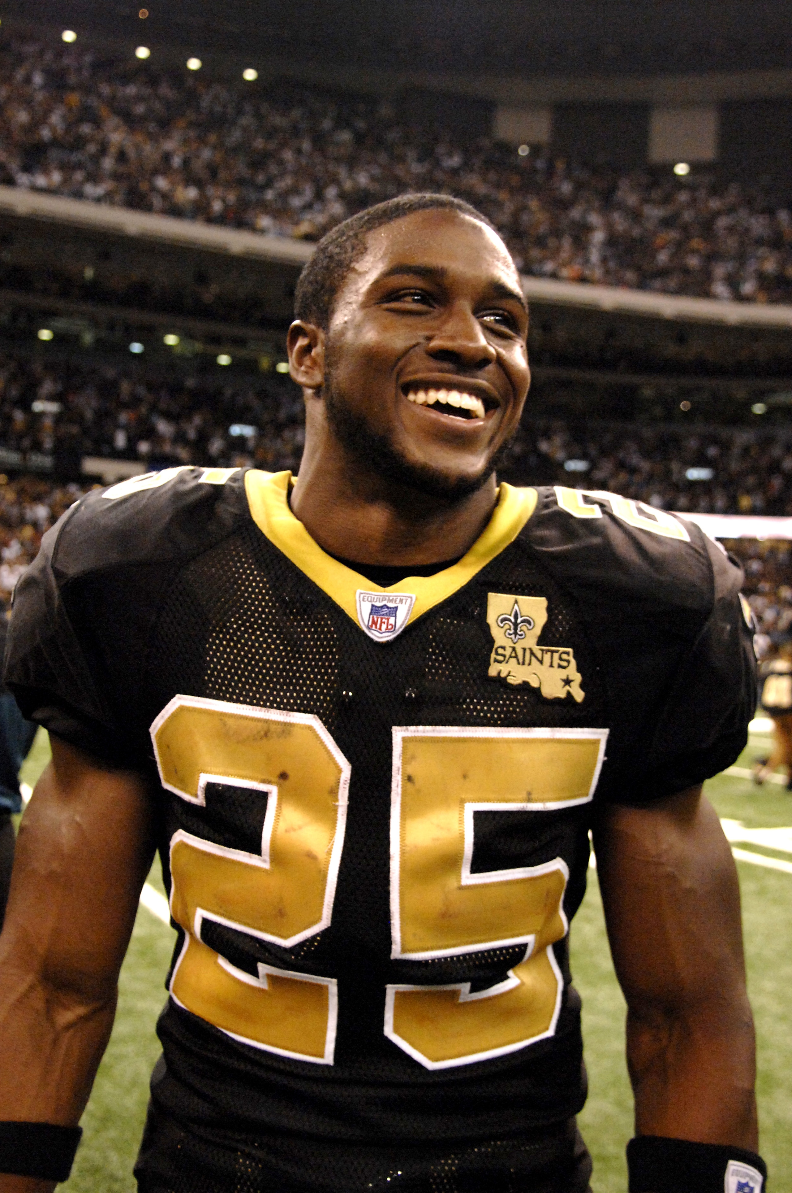 New Orleans Saints running back Reggie Bush is all smiles after play against the Philadelphia Eagles Oct. 15, 2006 in New Orleans.  The Saints won on a last-minute field goal.  (Photo by Al Messerschmidt/Getty Images)