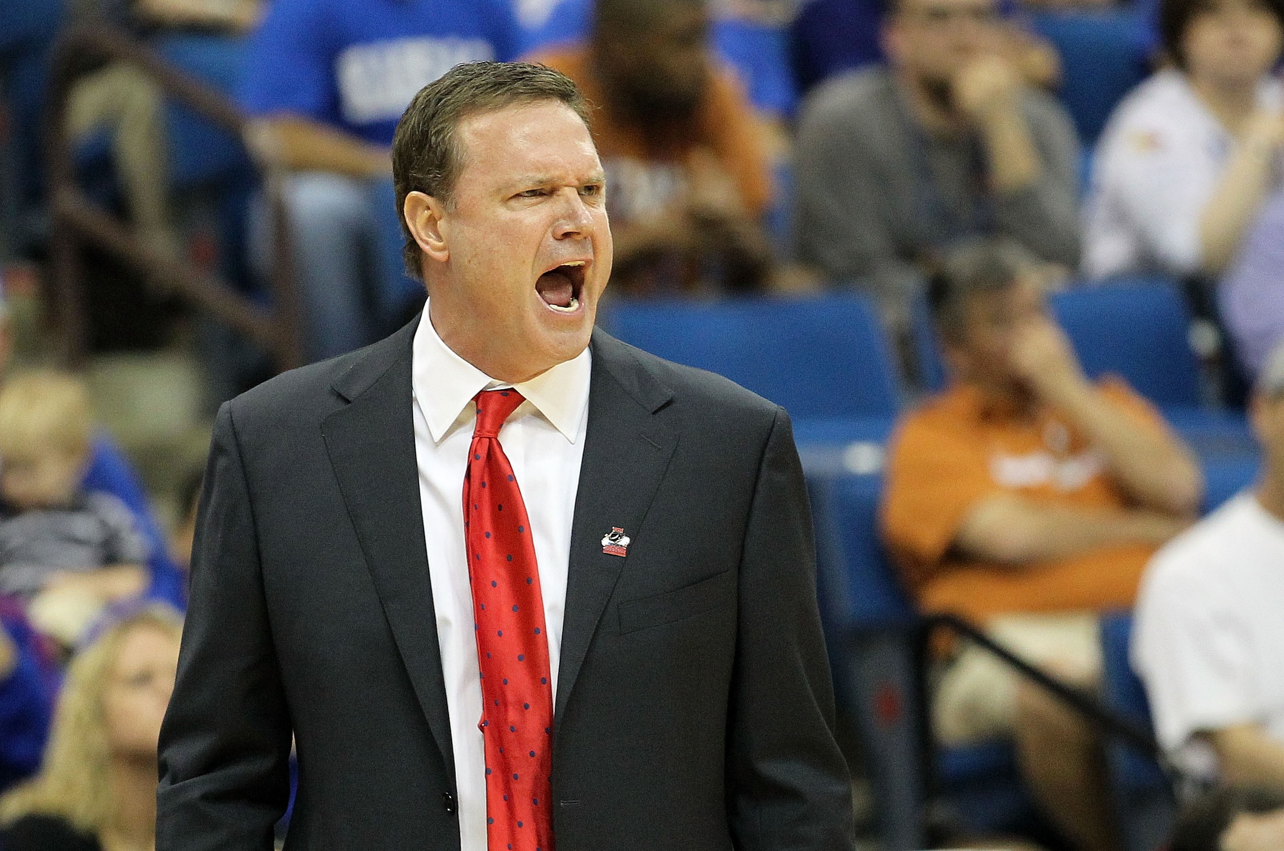 TULSA, OK - MARCH 20:  Head coach Bill Self of the Kansas Jayhawks yells from the sidelines against the Illinois Fighting Illini during the third round of the 2011 NCAA men's basketball tournament at BOK Center on March 20, 2011 in Tulsa, Oklahoma.  (Phot