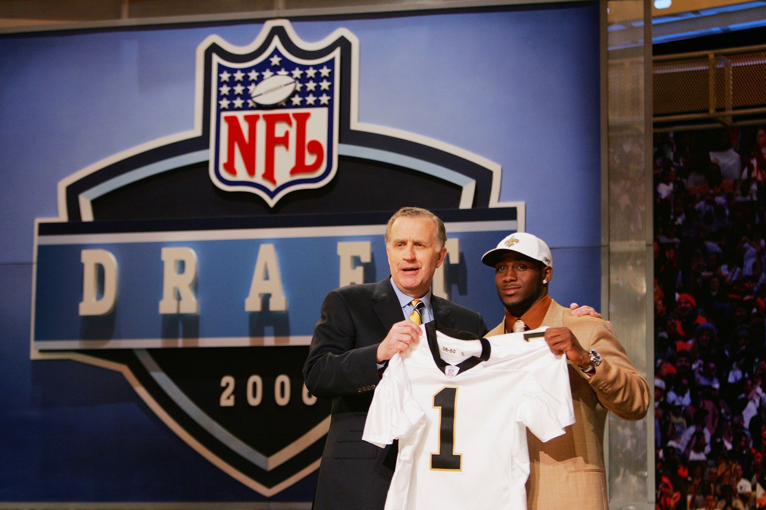 NEW YORK - APRIL 29:  Commissioner Paul Tagliabue and Reggie Bush pose for a photo after Bush was drafted by the New Orleans Saints during the 2006 NFL Draft on April 29, 2006 at Radio City Music Hall in New York, New York. (Photo by Chris Trotman/Getty I