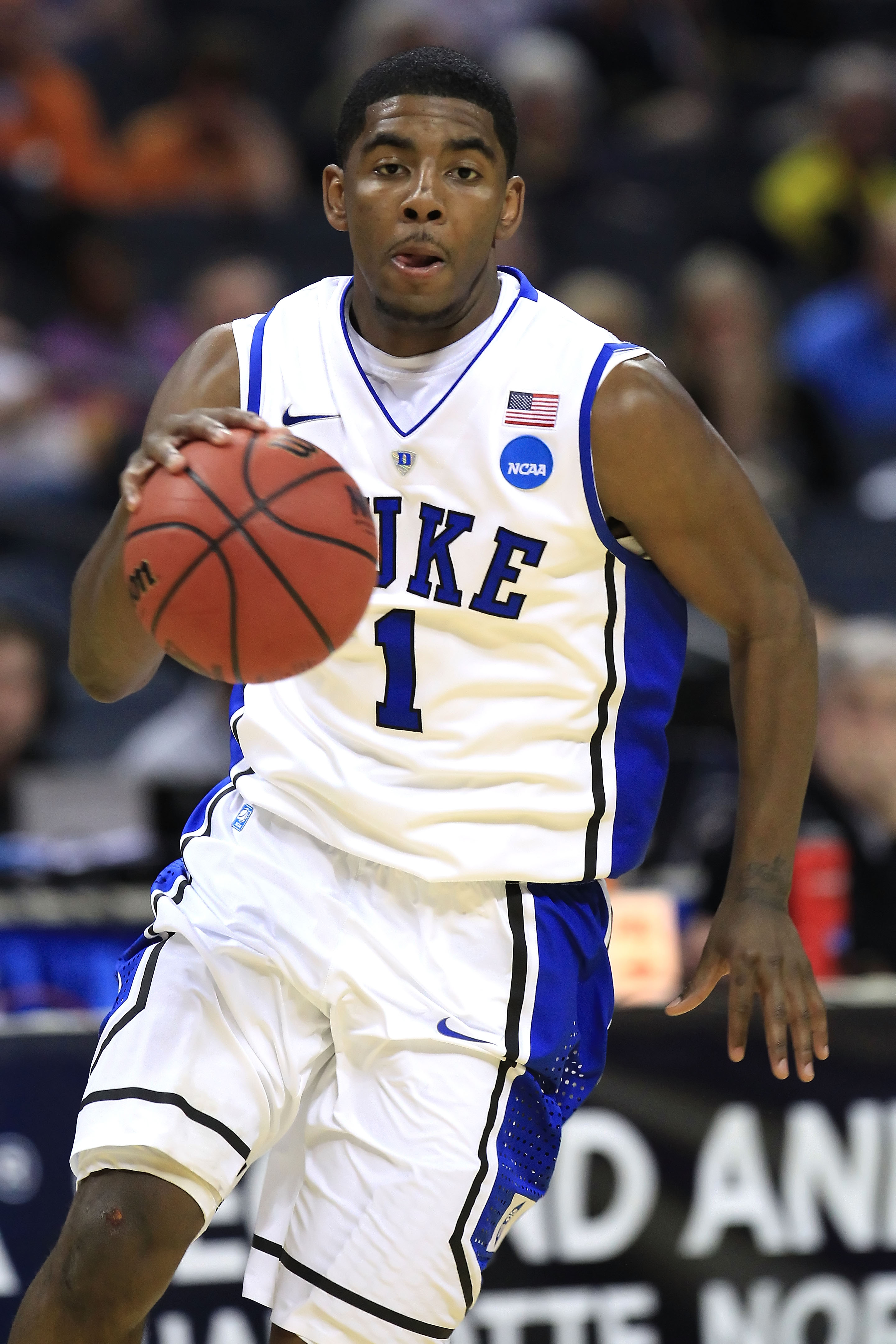CHARLOTTE, NC - MARCH 18:  Kyrie Irving #1 of the Duke Blue Devils moves the ball in the second half while taking on the Hampton Pirates during the second round of the 2011 NCAA men's basketball tournament at Time Warner Cable Arena on March 18, 2011 in C