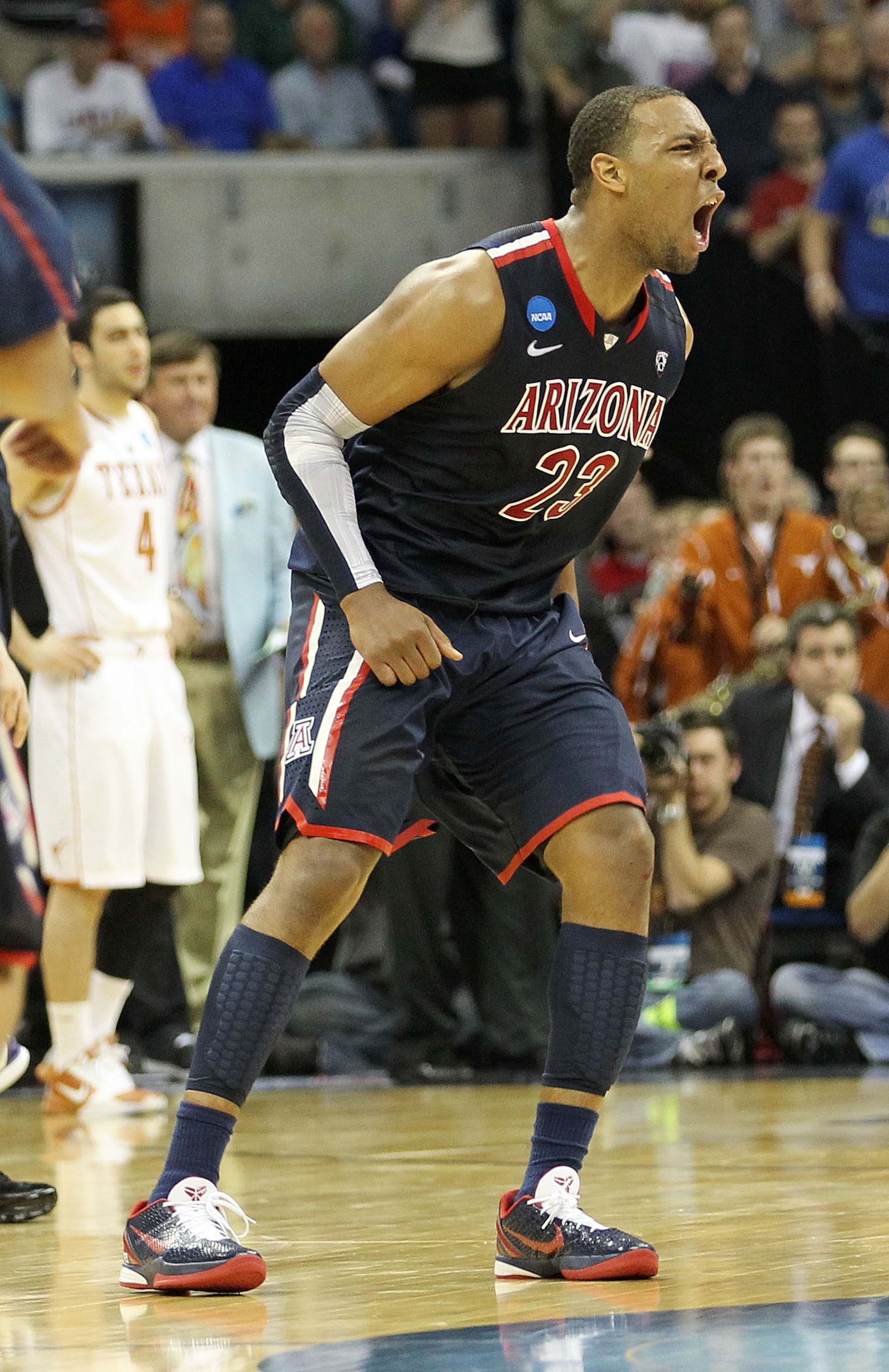 TULSA, OK - MARCH 20: Derrick Williams #23 of the Arizona Wildcats celebrates after defeating the Texas Longhorns 70-69 in the third round of the 2011 NCAA men's basketball tournament at BOK Center on March 20, 2011 in Tulsa, Oklahoma. (Photo by Ronald TULSA, OK - MARCH 20: Derrick Williams #23 of the Arizona Wildcats celebrates after defeating the Texas Longhorns 70-69 in the third round of the 2011 NCAA men's basketball tournament at BOK Center on March 20, 2011 in Tulsa, Oklahoma. (Photo by Ronald