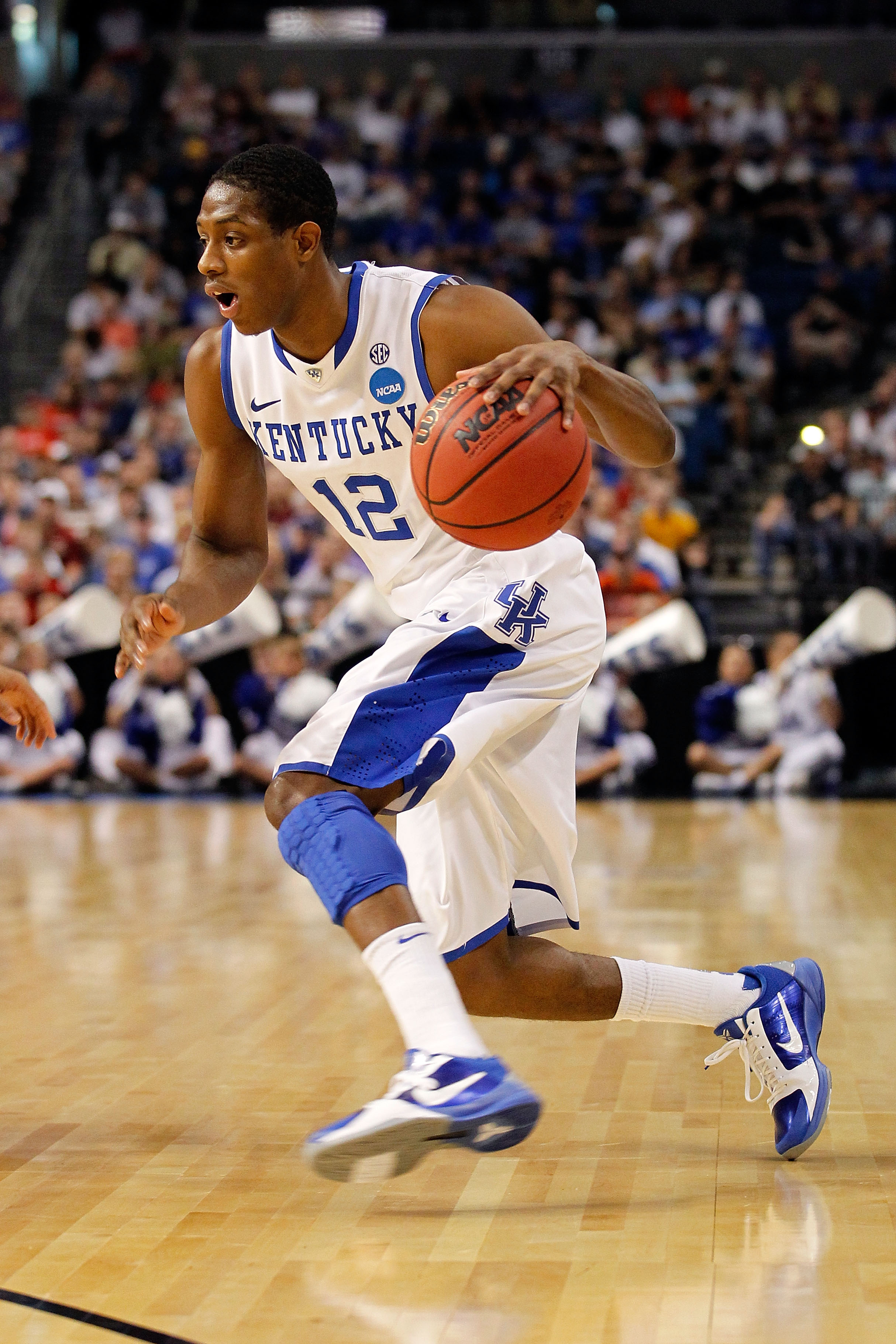 TAMPA, FL - MARCH 19:  Brandon Knight #12 of the Kentucky Wildcats drives against the West Virginia Mountaineers during the third round of the 2011 NCAA men's basketball tournament at St. Pete Times Forum on March 19, 2011 in Tampa, Florida.  (Photo by J.