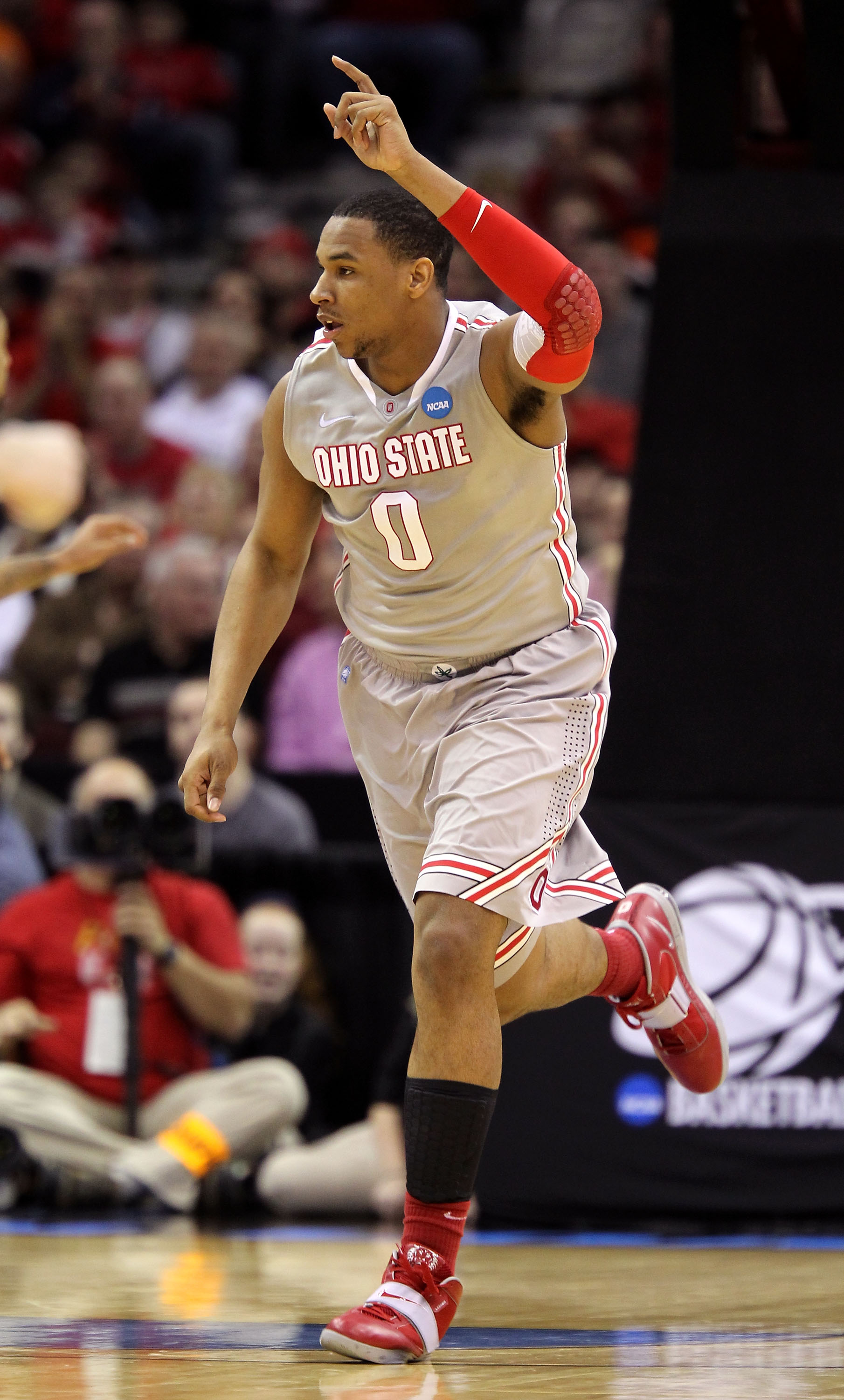CLEVELAND, OH - MARCH 20: Jared Sullinger #0 of the Ohio State Buckeyes reacts after a play in the first half against the George Mason Patriots during the third of the 2011 NCAA men's basketball tournament at Quicken Loans Arena on March 20, 2011 in Cleve