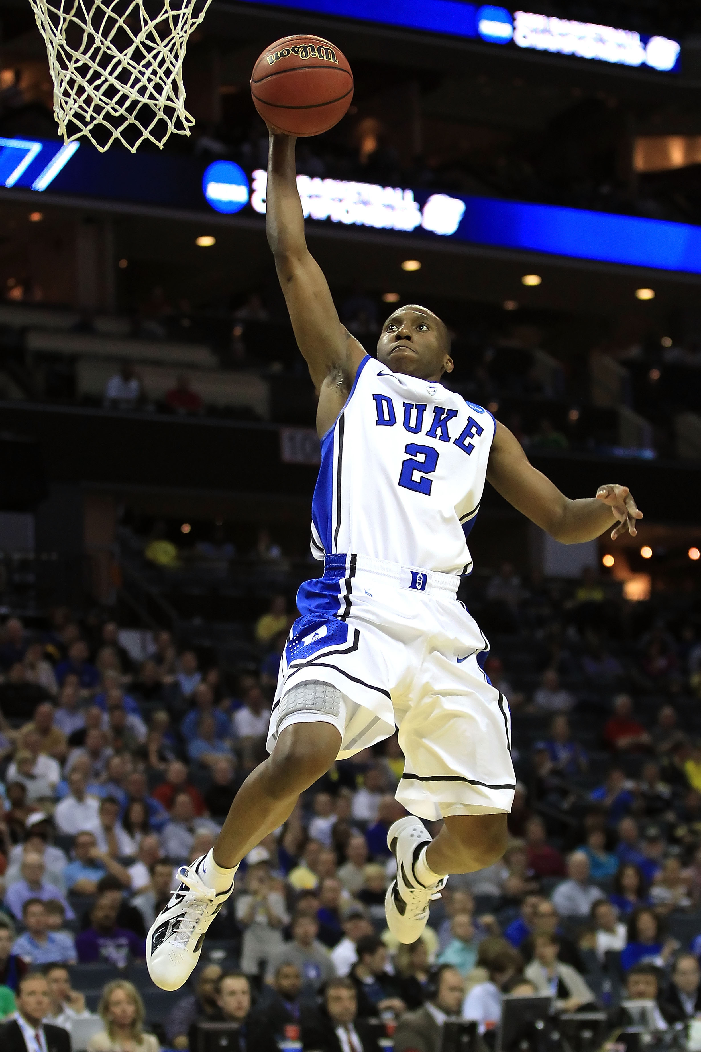 CHARLOTTE, NC - MARCH 18:  Nolan Smith #2 of the Duke Blue Devils dunks the ball in the second half while taking on the Hampton Pirates during the second round of the 2011 NCAA men's basketball tournament at Time Warner Cable Arena on March 18, 2011 in Ch