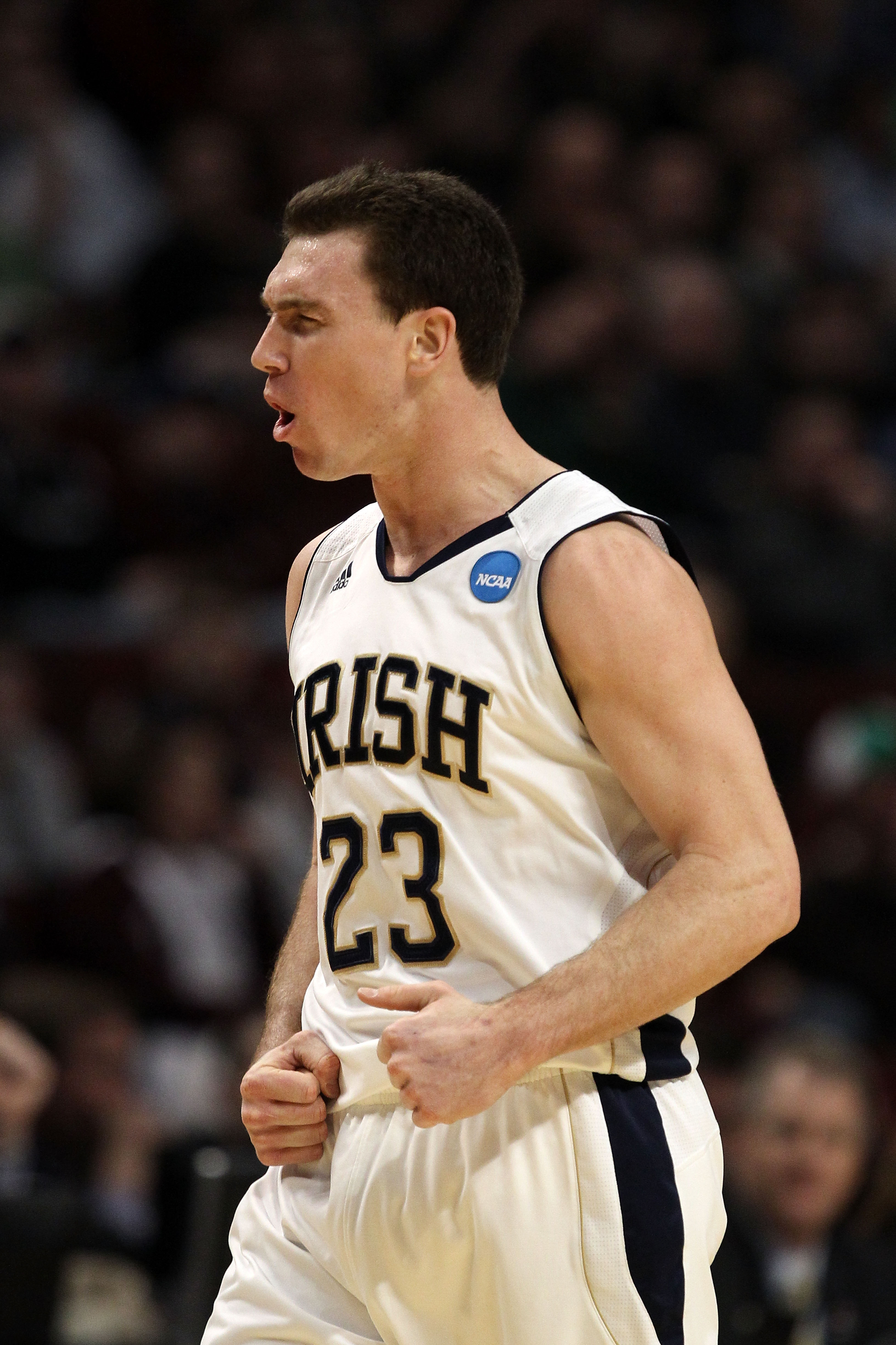 CHICAGO, IL - MARCH 18:  Ben Hansbrough #23 of the Notre Dame Fighting Irish celebrates after scoring against the Akron Zips in the first half during the second round of the 2011 NCAA men's basketball tournament at the United Center on March 18, 2011 in C