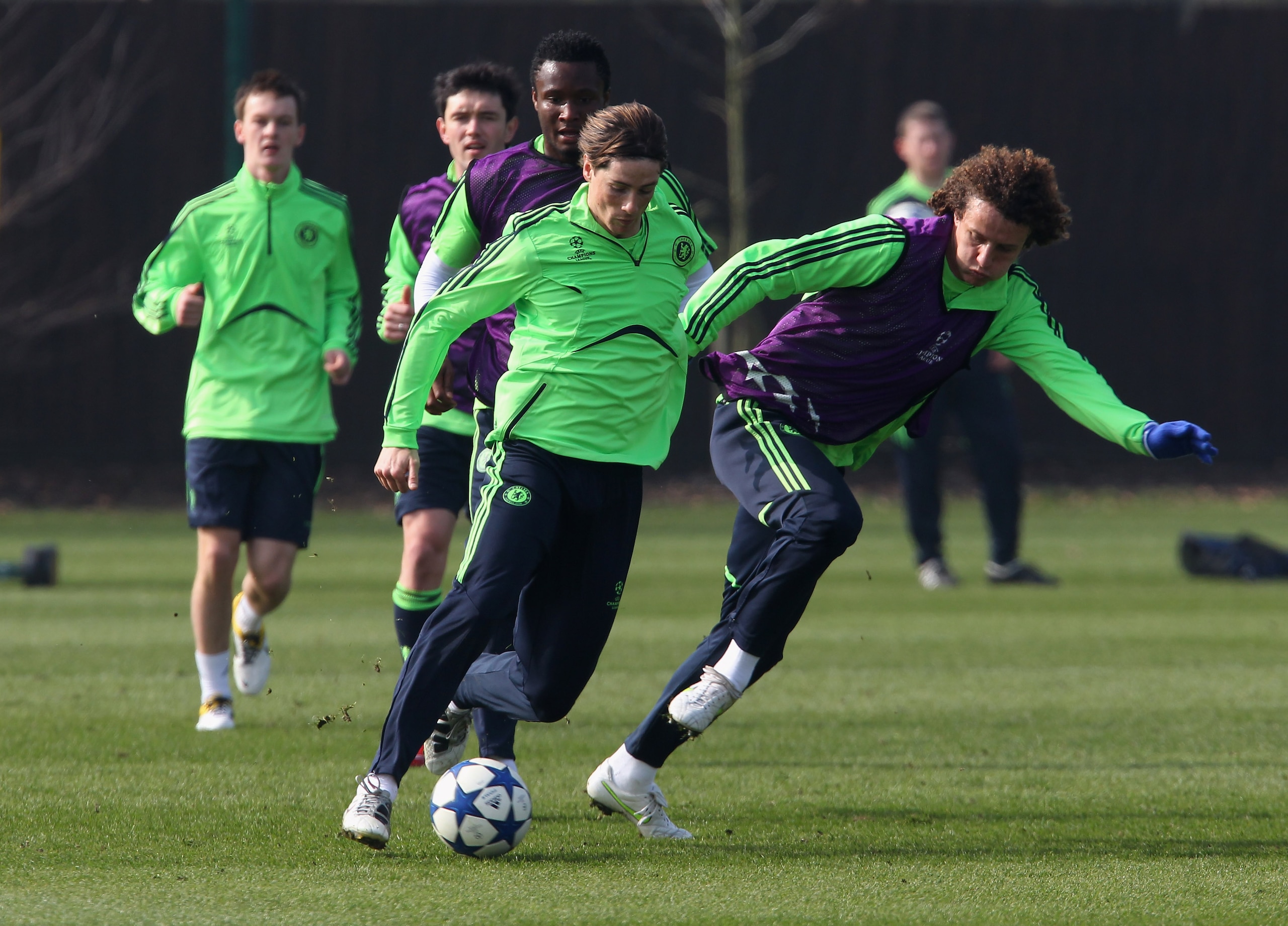 COBHAM, ENGLAND - MARCH 15:  Fernando Torres and David Luiz of Chelsea battle for the ball during a training session prior to the UEFA Champions League round of 16 second leg match between Chelsea and FC Copenhagen on March 15, 2011 in Cobham, England.  (