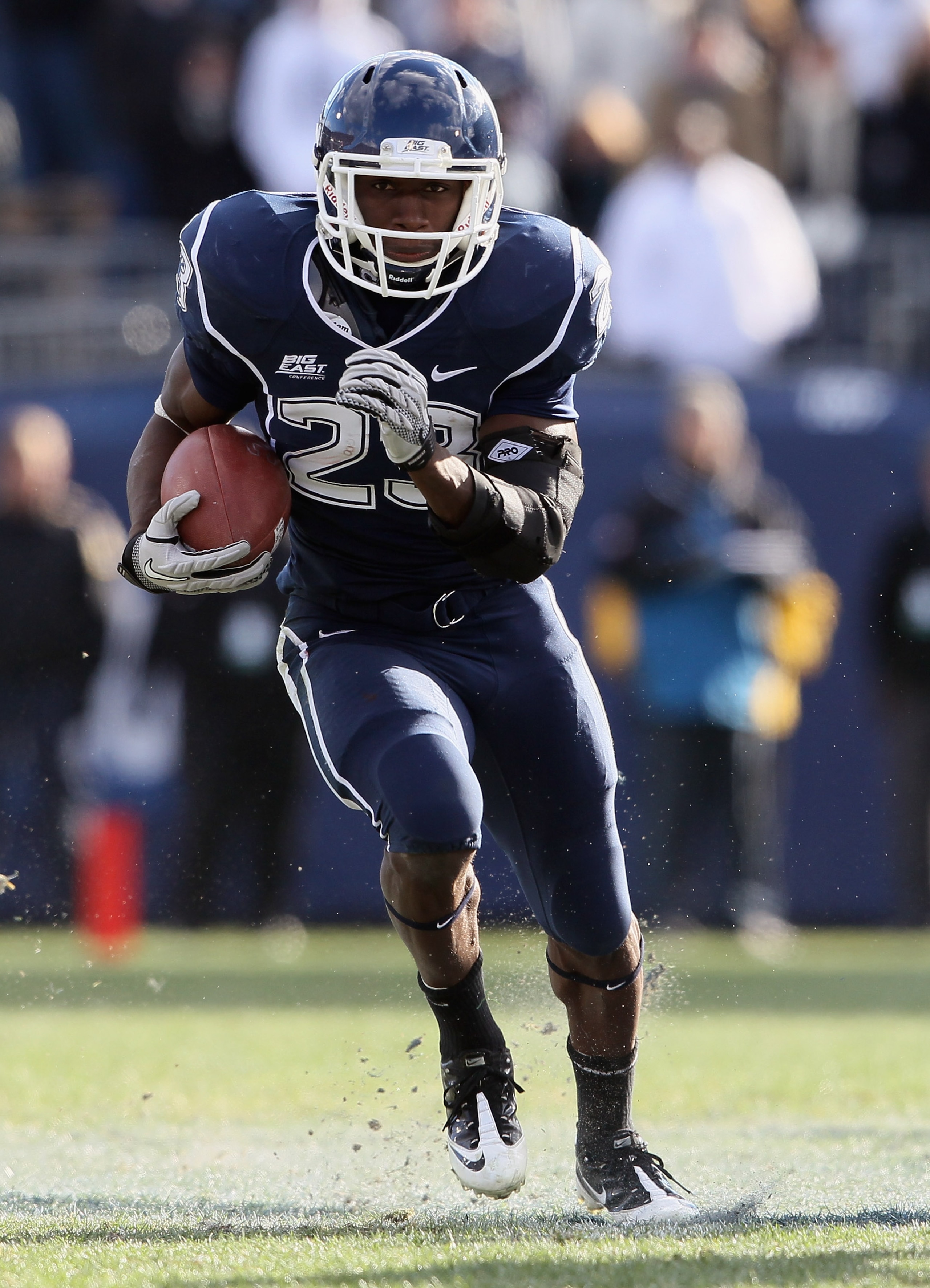 EAST HARTFORD, CT - NOVEMBER 27:  Jordan Todman #23 of the Connecticut Huskies carries the in the first quarter against the Cincinnati Bearcats on November 27, 2010 at Rentschler Field in East Hartford, Connecticut.  (Photo by Elsa/Getty Images)