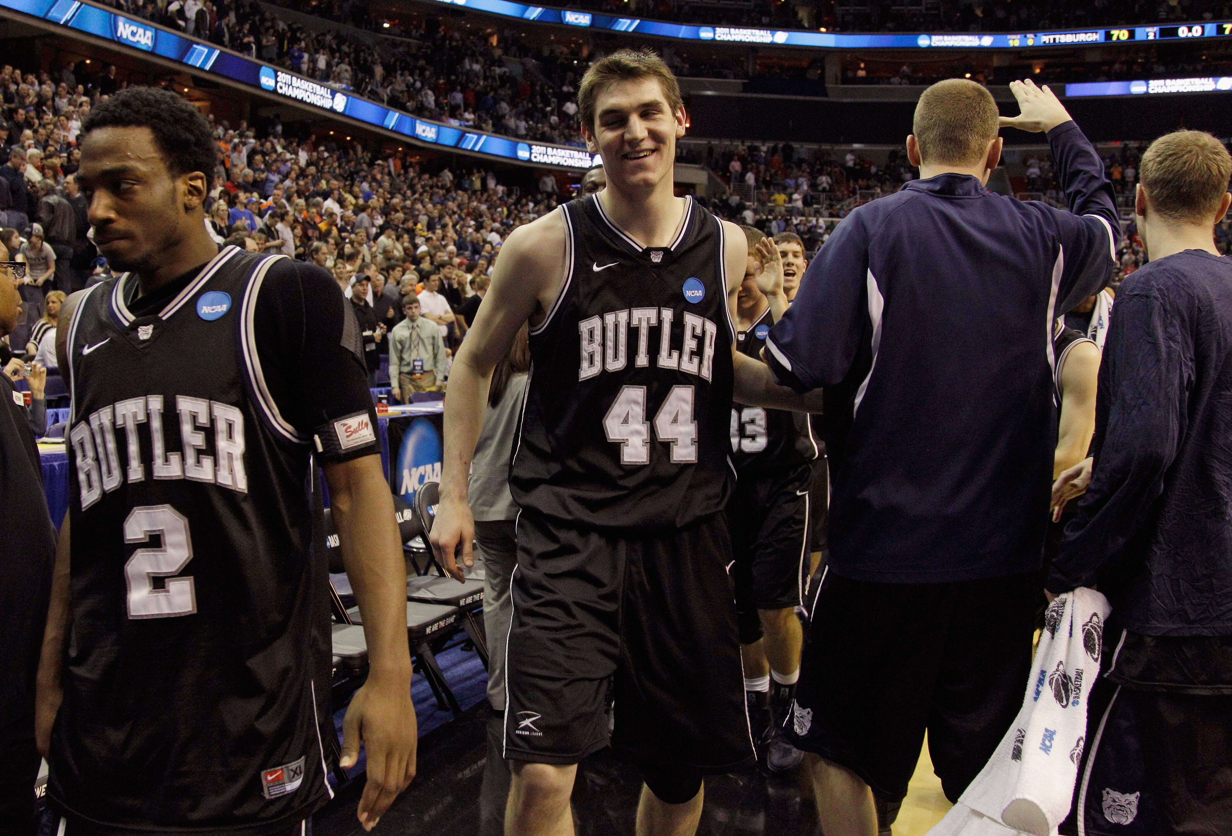 WASHINGTON - MARCH 19:  Andrew Smith #44 of Butler and teammate Shawn Vanzant #2 walk off the court after Butler's victory of Pittsburgh in the third round of the 2011 NCAA men's basketball tournament at Verizon Center on March 19, 2011 in Washington, DC.