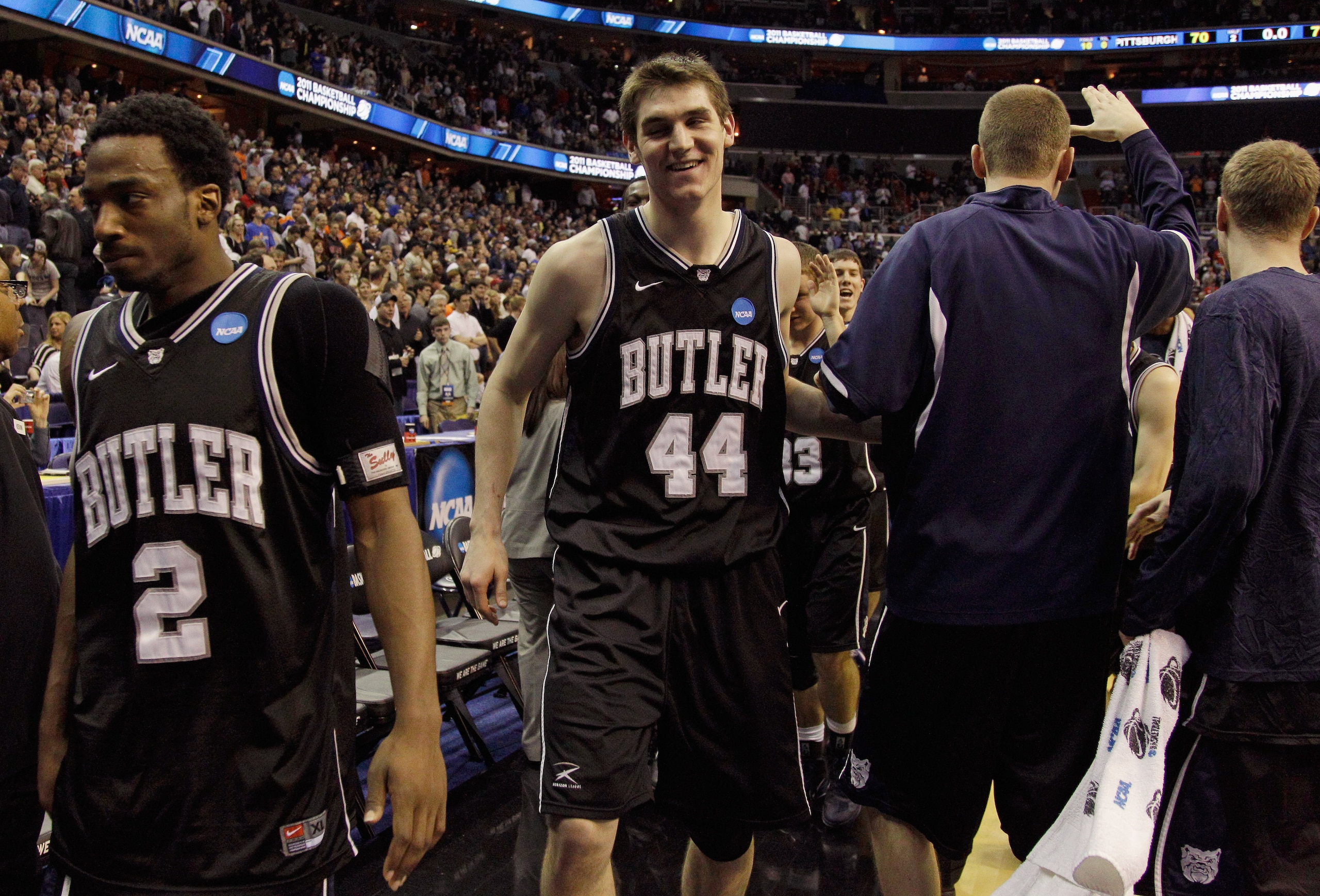 WASHINGTON - MARCH 19:  Andrew Smith #44 of Butler and teammate Shawn Vanzant #2 walk off the court after Butler's victory of Pittsburgh in the third round of the 2011 NCAA men's basketball tournament at Verizon Center on March 19, 2011 in Washington, DC.