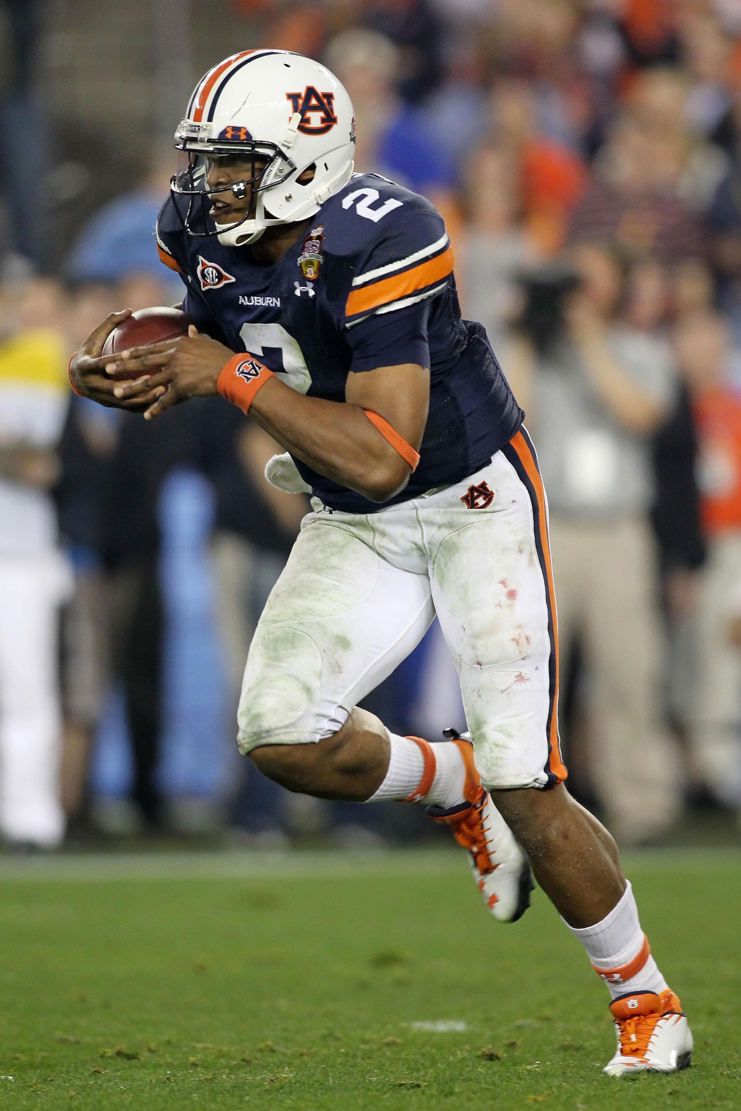 GLENDALE, AZ - JANUARY 10:  Cameron Newton #2 of the Auburn Tigers runs down field against the Oregon Ducks during the Tostitos BCS National Championship Game at University of Phoenix Stadium on January 10, 2011 in Glendale, Arizona.  (Photo by Jonathan F