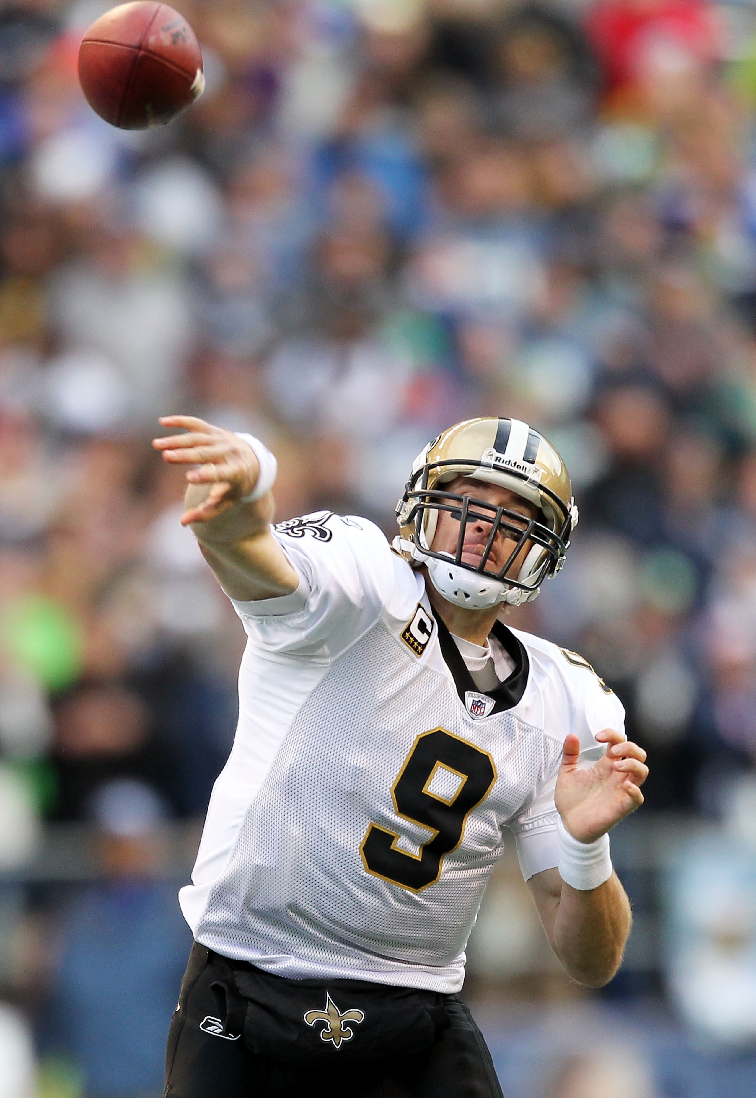 SEATTLE, WA - JANUARY 08:  Quarterback Drew Brees #9 of the New Orleans Saints throws the ball against the Seattle Seahawks during the 2011 NFC wild-card playoff game at Qwest Field on January 8, 2011 in Seattle, Washington.  (Photo by Otto Greule Jr/Gett