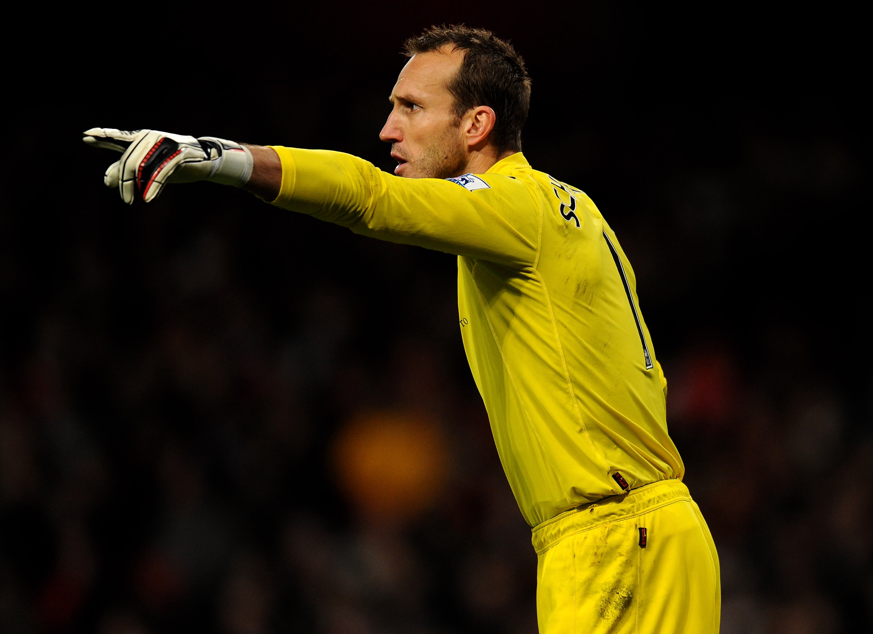 LONDON, ENGLAND - DECEMBER 04:  Mark Schwarzer of Fulham reacts during the Barclays Premier League match between Arsenal and Fulham at the Emirates Stadium on December 4, 2010 in London, England.  (Photo by Mike Hewitt/Getty Images)