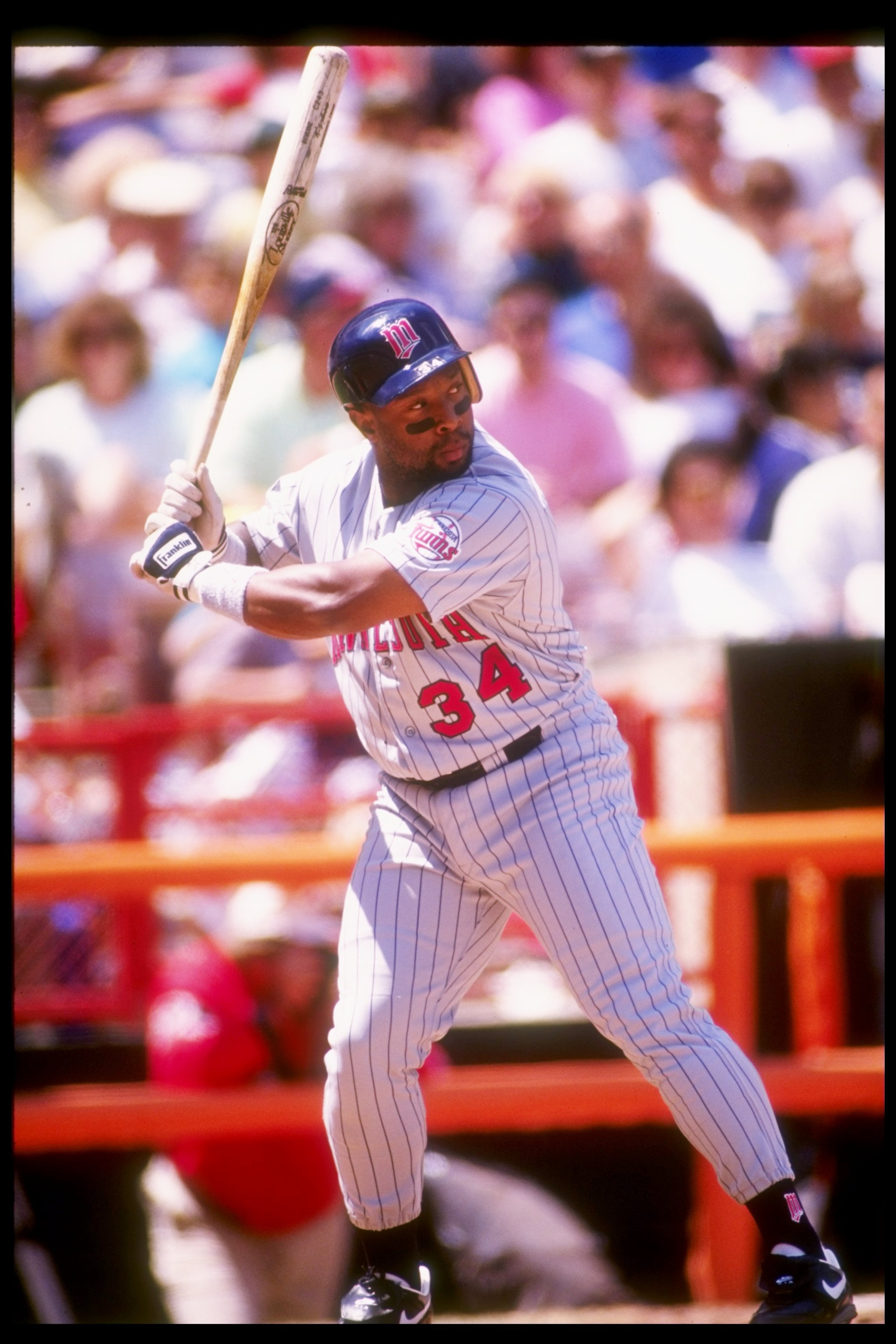 Outfielder Kirby Puckett of the Minnesota Twins at bat during a game against the California Angels at Anaheim Stadium in Anaheim, California. Outfielder Kirby Puckett of the Minnesota Twins at bat during a game against the California Angels at Anaheim Stadium in Anaheim, California.