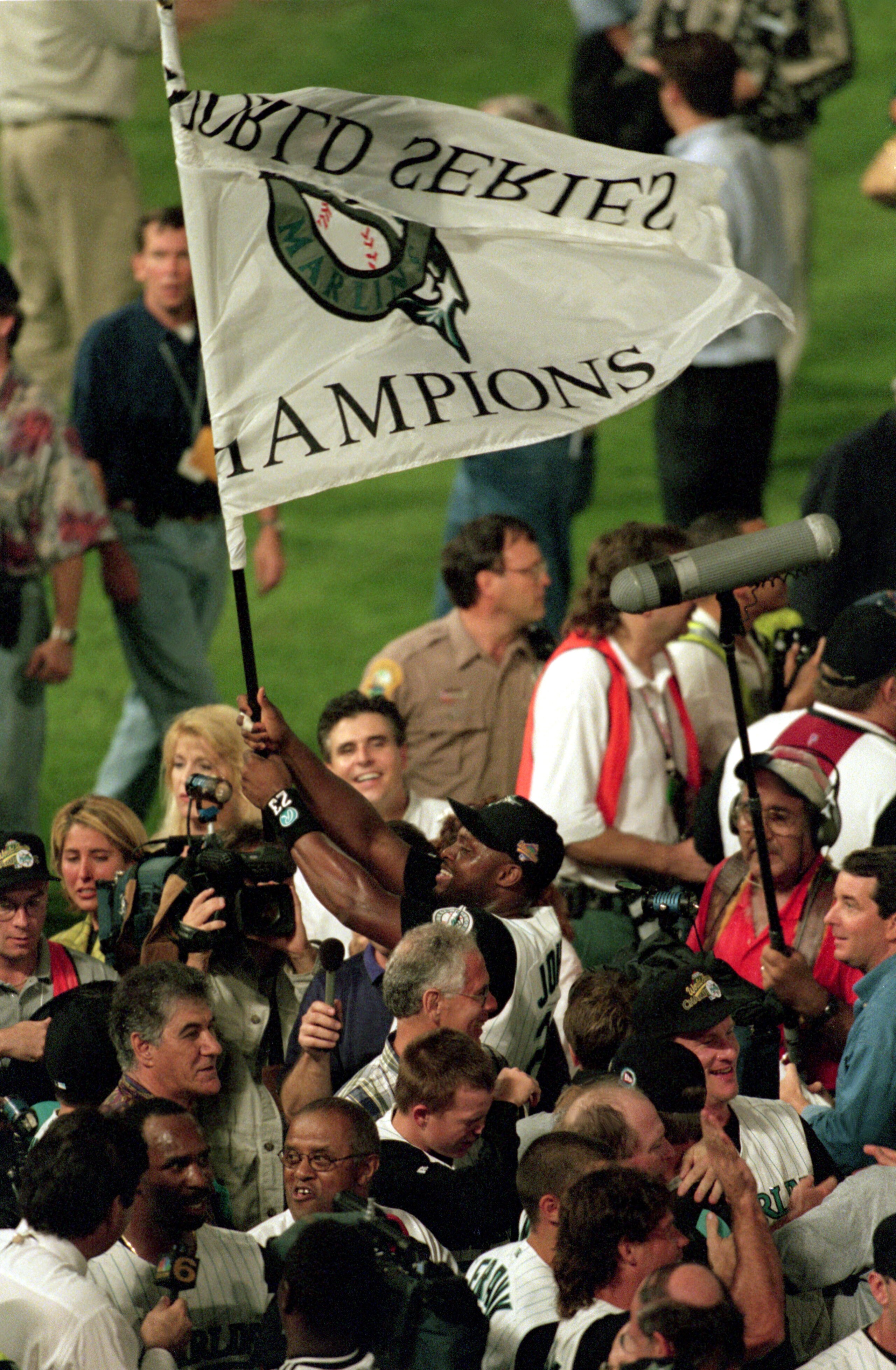 MIAMI - OCTOBER 26: Charles Johnson #23 of the Florida Marlins celebrates his team's victory over the Cleveland Indians in Game seven of the 1997 World Series at Pro Player Stadium on October 26, 1997 in Miami, Florida. The Marlins defeated the Indians 3 MIAMI - OCTOBER 26: Charles Johnson #23 of the Florida Marlins celebrates his team's victory over the Cleveland Indians in Game seven of the 1997 World Series at Pro Player Stadium on October 26, 1997 in Miami, Florida. The Marlins defeated the Indians 3