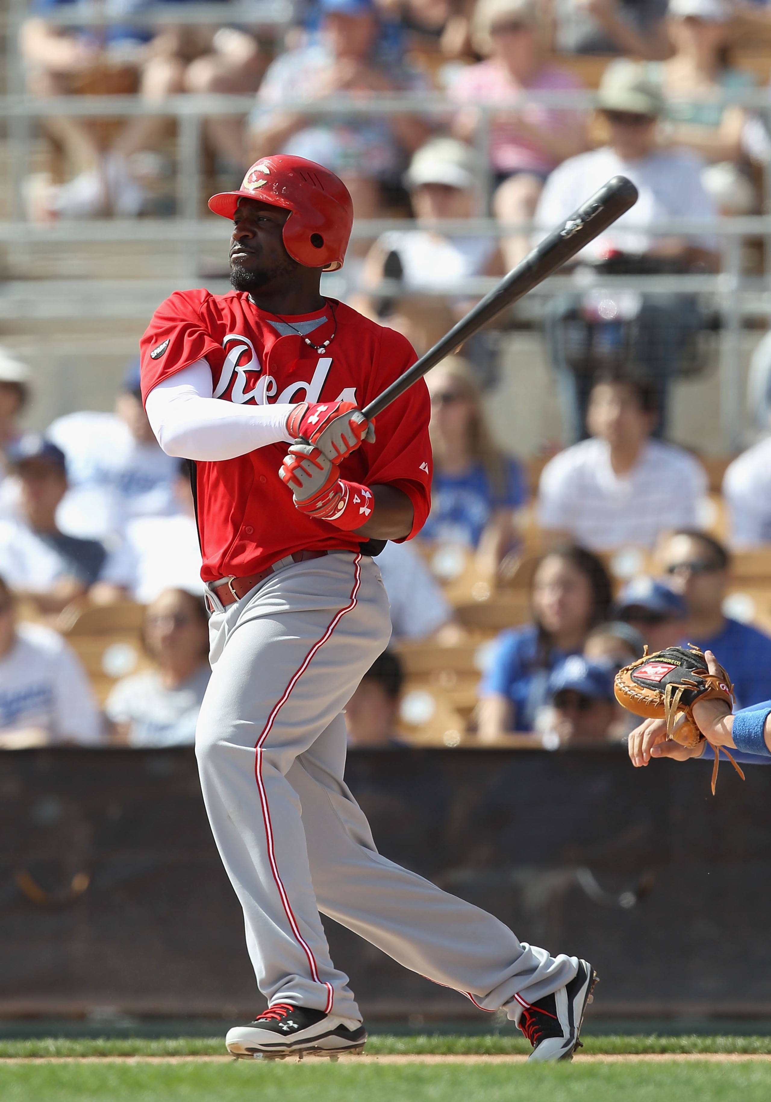 GLENDALE, AZ - MARCH 05:  Brandon Phillips #4 of the Cincinnati Reds bats against the Los Angeles Dodgers during the spring training game at Camelback Ranch on March 5, 2011 in Glendale, Arizona.  (Photo by Christian Petersen/Getty Images)