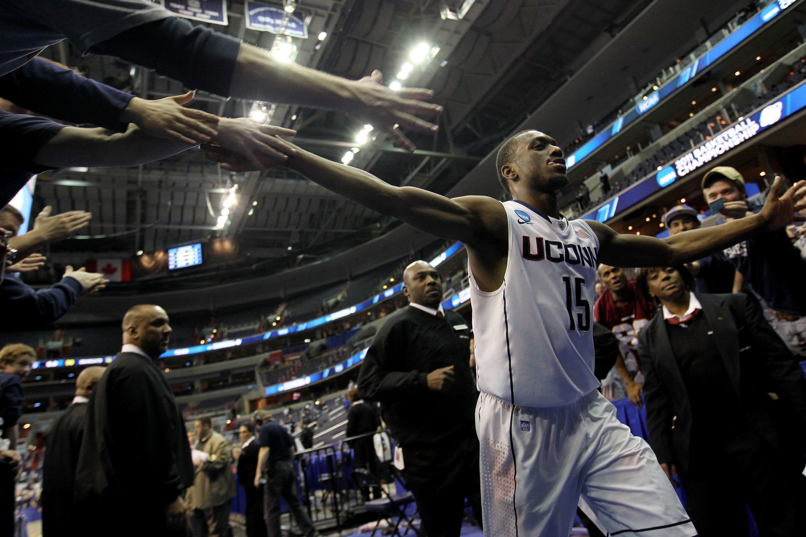 WASHINGTON - MARCH 19: Kemba Walker #15 of the Connecticut Huskies celebrates their 69-58 win over the Cincinnati Bearcats during the third round of the 2011 NCAA men's basketball tournament at Verizon Center on March 19, 2011 in Washington, DC. (Photo WASHINGTON - MARCH 19: Kemba Walker #15 of the Connecticut Huskies celebrates their 69-58 win over the Cincinnati Bearcats during the third round of the 2011 NCAA men's basketball tournament at Verizon Center on March 19, 2011 in Washington, DC. (Photo