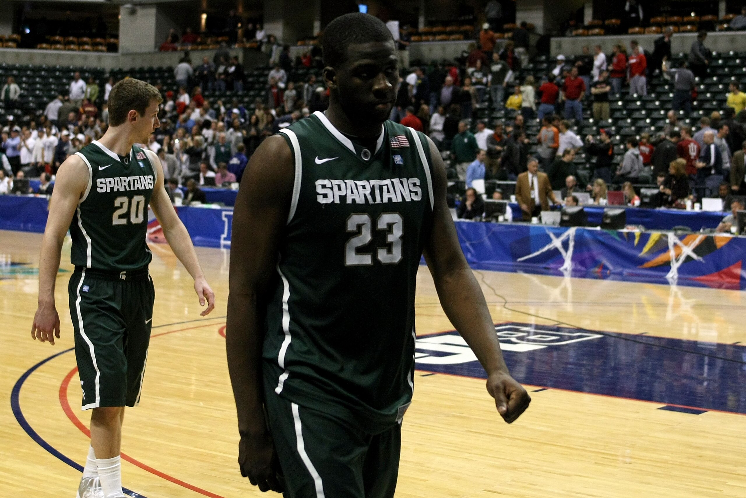 INDIANAPOLIS, IN - MARCH 12:  Draymond Green #23 of the Michigan State Spartans walks off the court after they lost 61-48 against the Penn State Nittany Lions during the semifinals of the 2011 Big Ten Men's Basketball Tournament at Conseco Fieldhouse on M