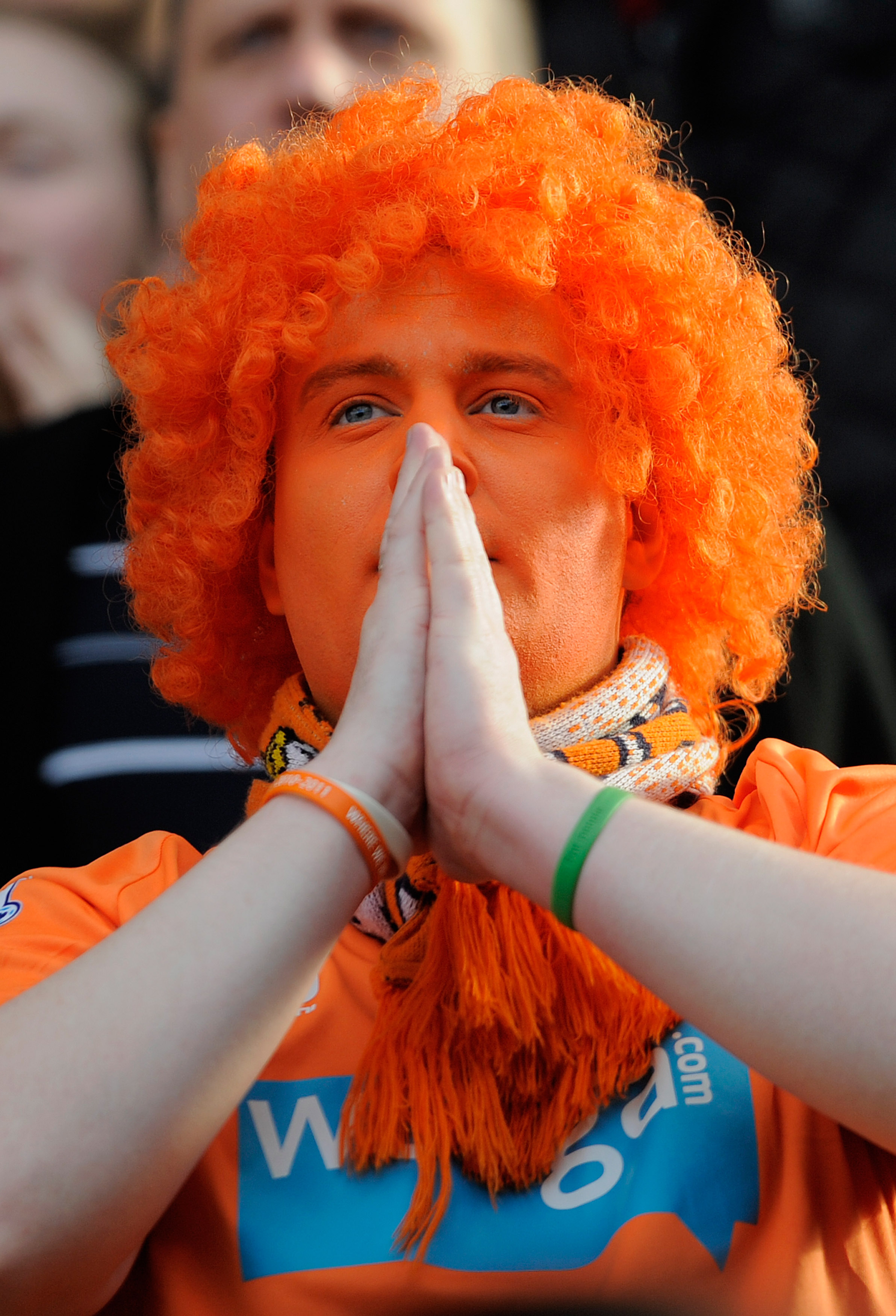BLACKBURN, ENGLAND - MARCH 19: A Blackpool fan looks on as Charlie Adam steps up to take his penalty to make it 1-0 during the Barclays Premier League match between Blackburn Rovers and Blackpool at Ewood Park on March 19, 2011 in Blackburn, England.  (Ph