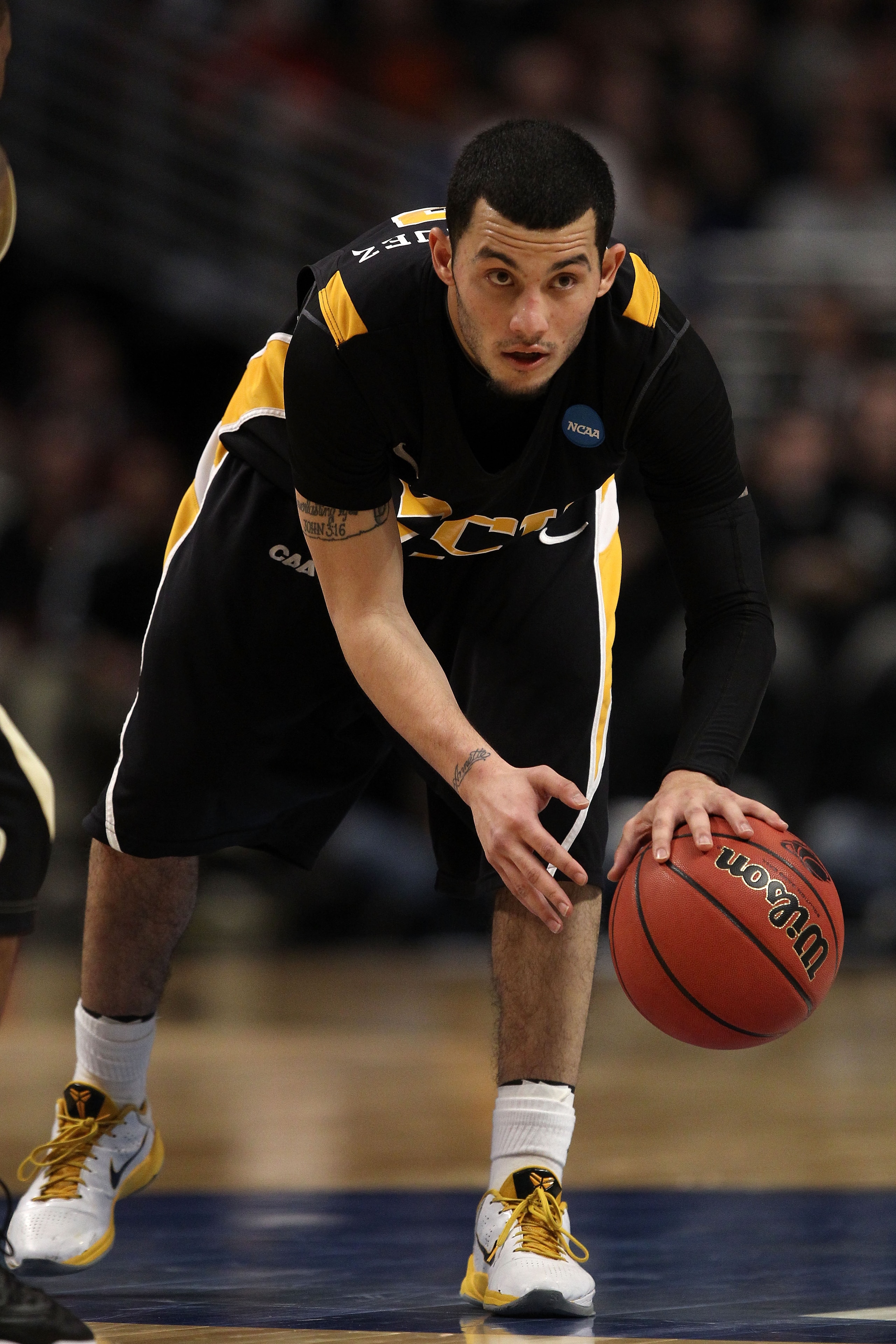 CHICAGO, IL - MARCH 20:  Joey Rodriguez #12 of the Virginia Commonwealth Rams dribbles against the Purdue Boilermakers in the second half during the third round of the 2011 NCAA men's basketball tournament at the United Center on March 20, 2011 in Chicago