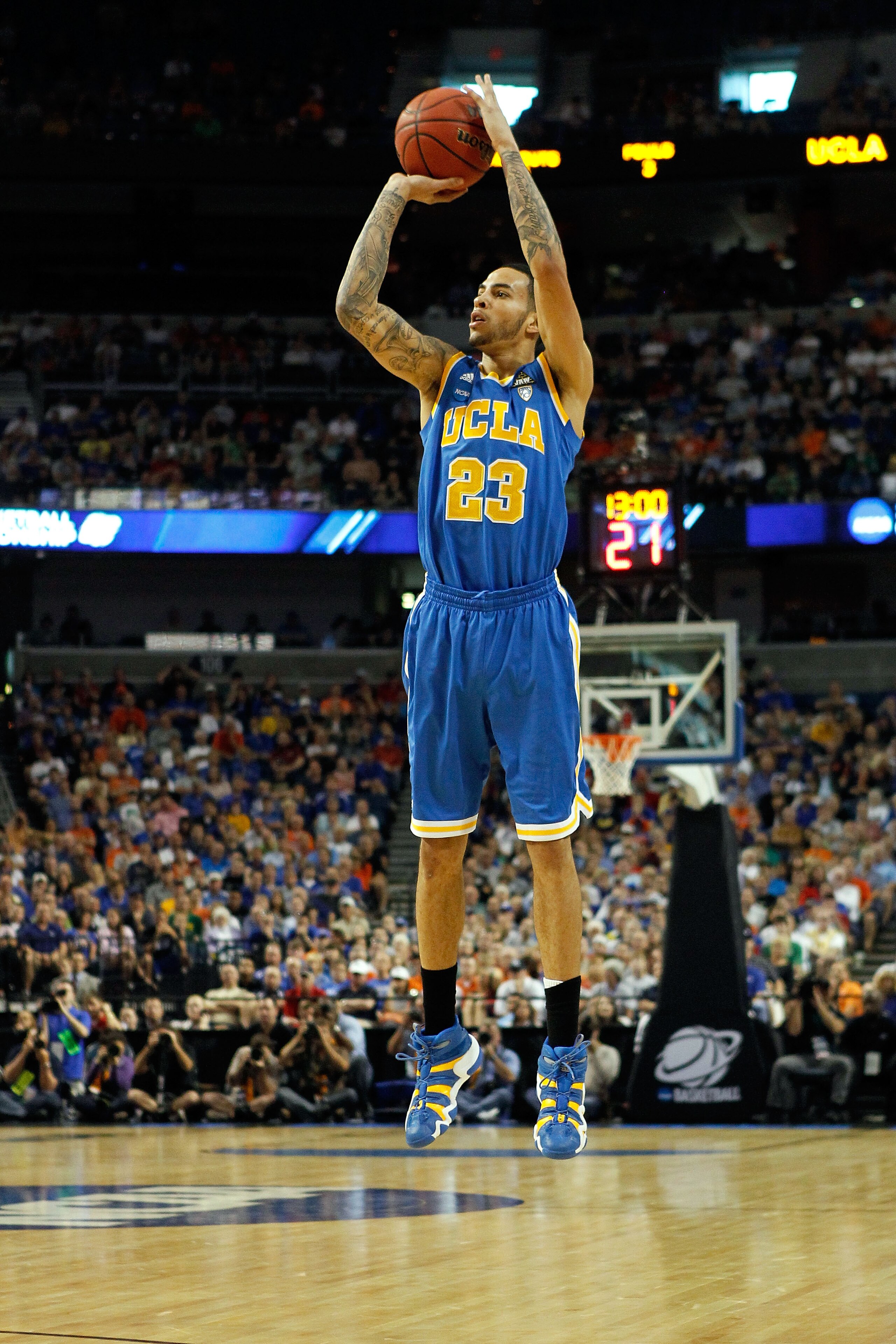 TAMPA, FL - MARCH 19:  Tyler Honeycutt #23 of the UCLA Bruins attempts a shot against the Florida Gators during the third round of the 2011 NCAA men's basketball tournament at St. Pete Times Forum on March 19, 2011 in Tampa, Florida.  (Photo by J. Meric/G
