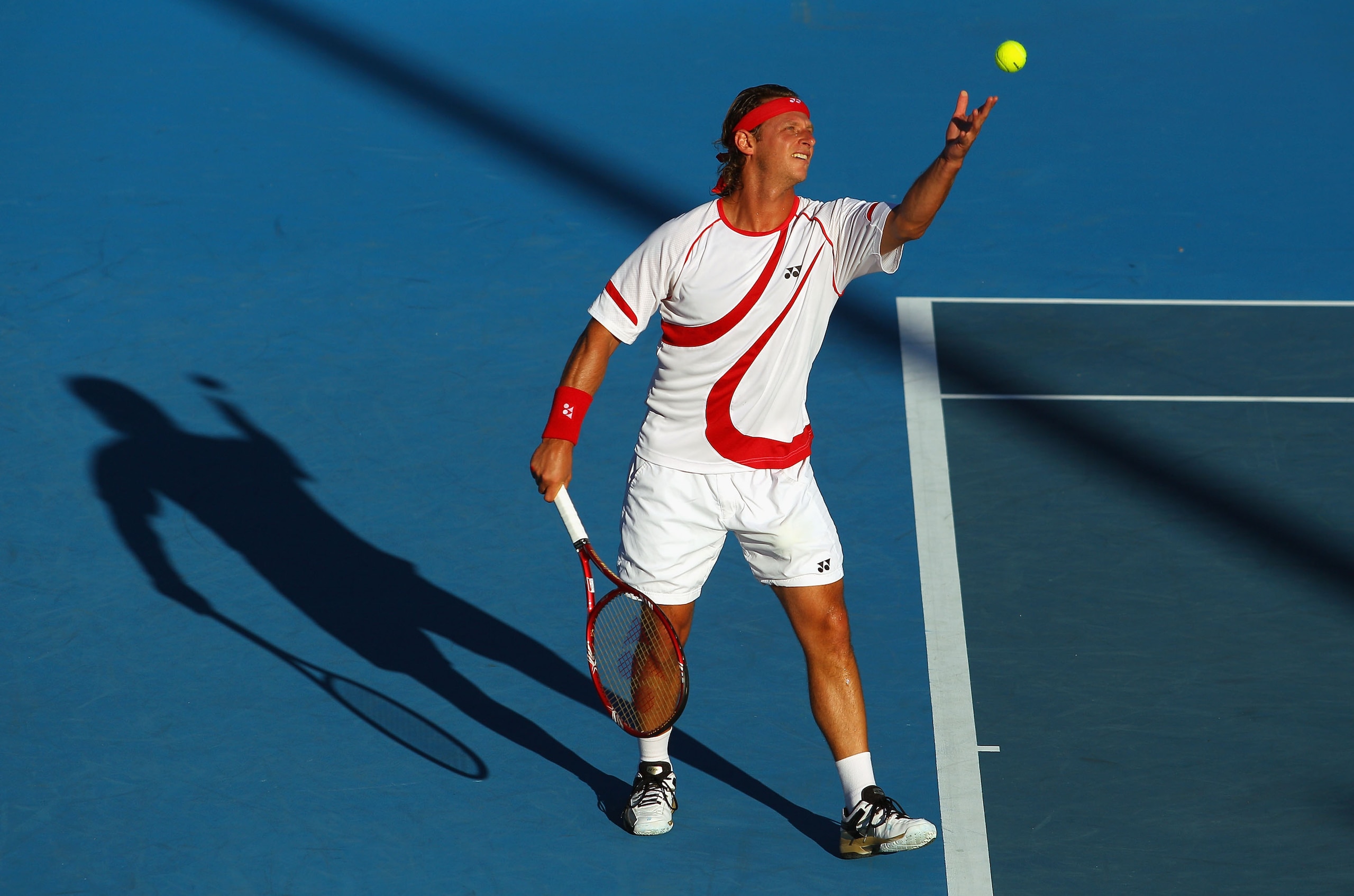 MELBOURNE, AUSTRALIA - JANUARY 20:  David Nalbandian of Argentina serves in his second round match against Richard Berankis of  Lithuania during day four of the 2011 Australian Open at Melbourne Park on January 20, 2011 in Melbourne, Australia.  (Photo by