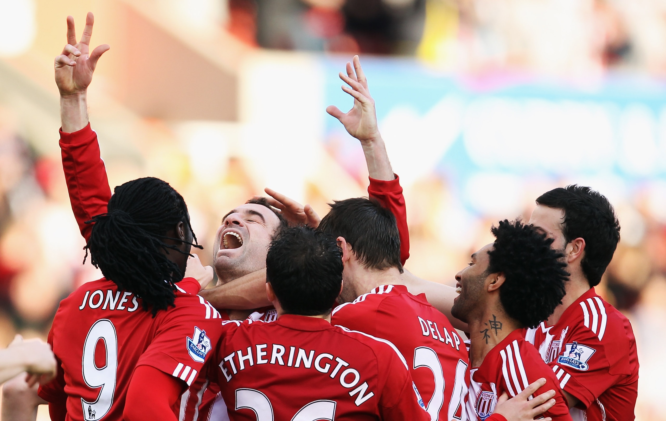 STOKE ON TRENT, ENGLAND - MARCH 19:  Danny Higginbotham of Stoke City celebrates scoring during the Barclays Premier League match between Stoke City and Newcastle United at Britannia Stadium on March 19, 2011 in Stoke on Trent, England.  (Photo by Bryn Le