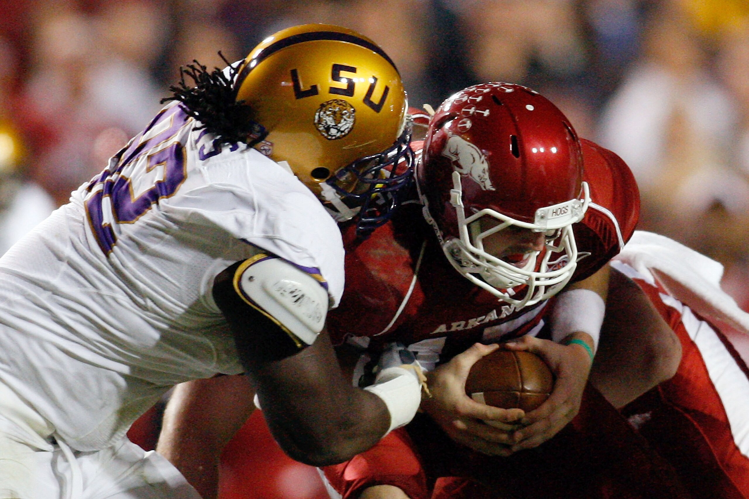 BATON ROUGE, LA - NOVEMBER 28: Quarterback Ryan Mallett #15 of the Arkansa Razorbacks is sacked by Drake Nevis #92 of the Louisiana State University Tigers at Tiger Stadium on November 28, 2009 in Baton Rouge, Louisiana. (Photo by Chris Graythen/Getty I BATON ROUGE, LA - NOVEMBER 28: Quarterback Ryan Mallett #15 of the Arkansa Razorbacks is sacked by Drake Nevis #92 of the Louisiana State University Tigers at Tiger Stadium on November 28, 2009 in Baton Rouge, Louisiana. (Photo by Chris Graythen/Getty I