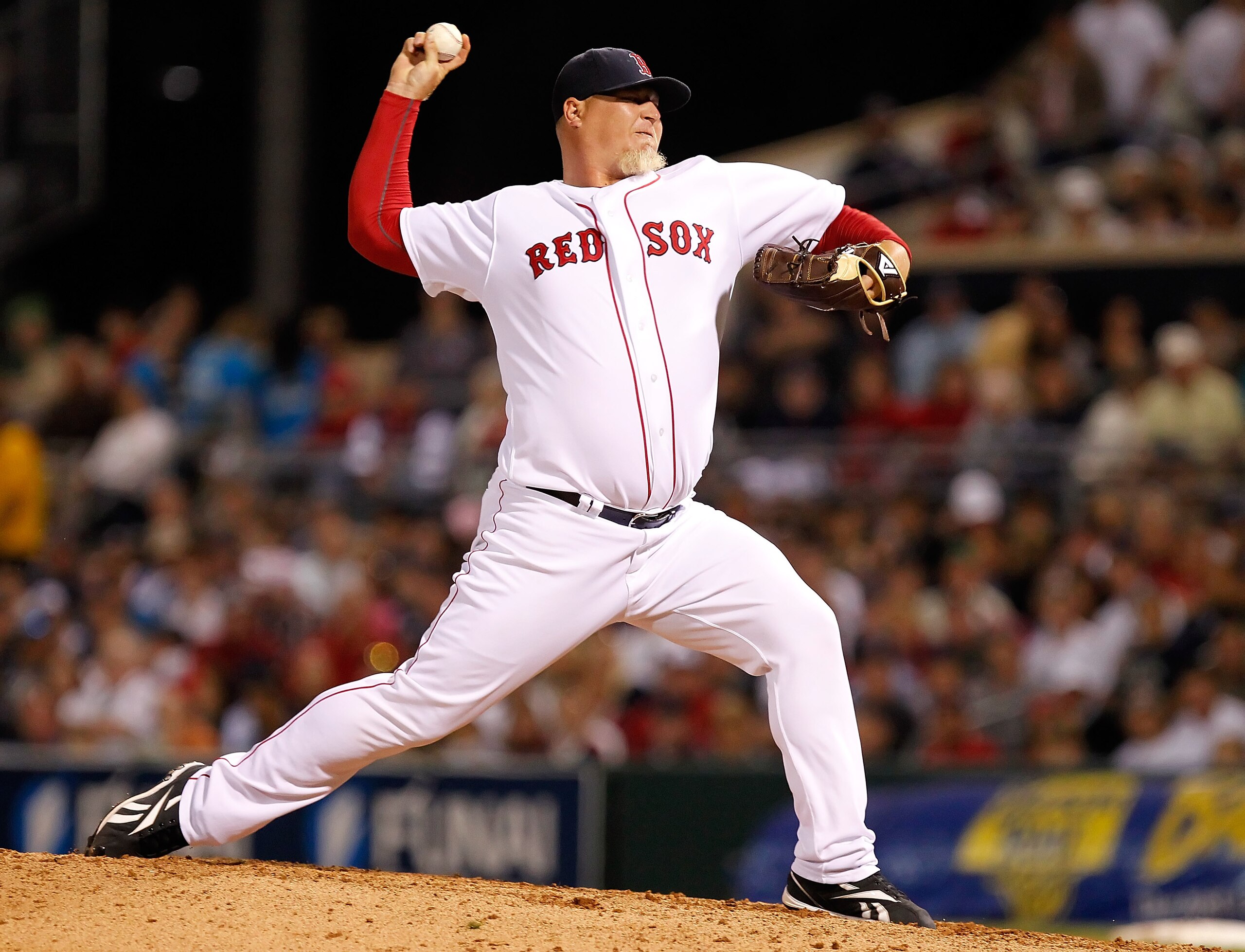 FORT MYERS, FL - MARCH 14:  Pitcher Bobby Jenks #52 of the Boston Red Sox pitches against the New York Yankees during a Grapefruit League Spring Training Game at City of Palms Park on March 14, 2011 in Fort Myers, Florida.  (Photo by J. Meric/Getty Images