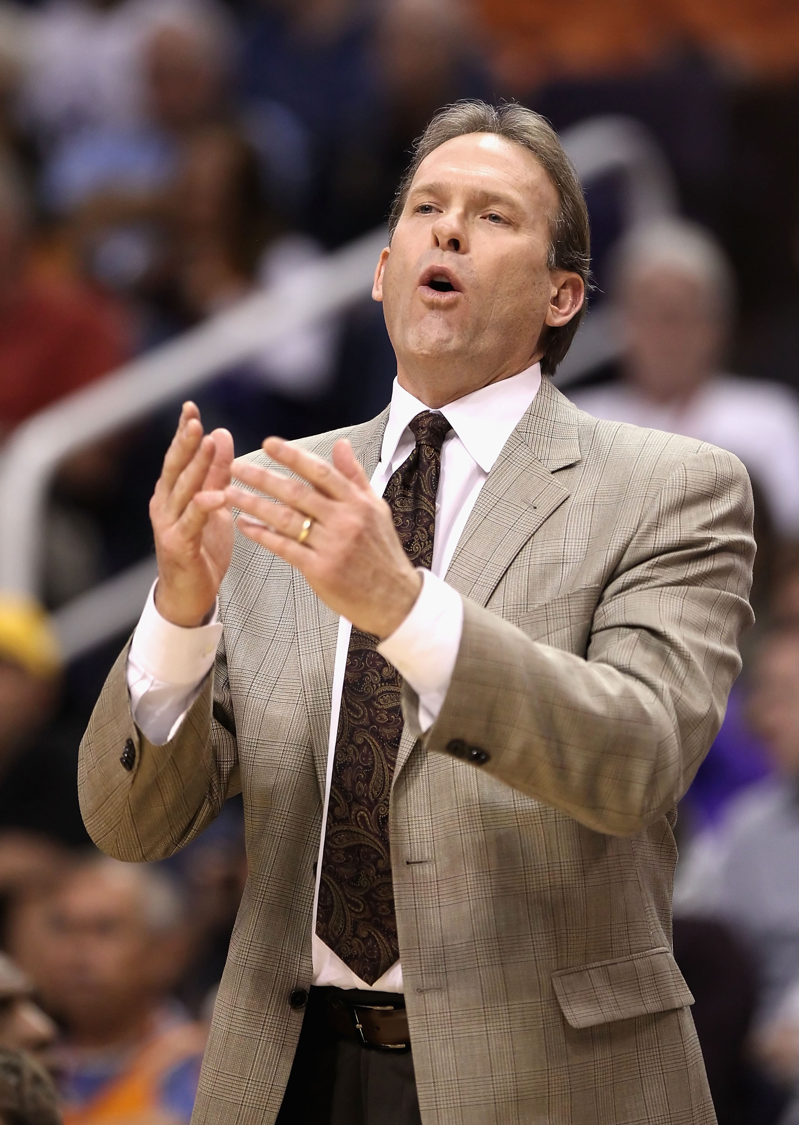 PHOENIX - DECEMBER 15:  Head coach Kurt Rambis of the Minnesota Timberwolves reacts during the NBA game against the Phoenix Suns at US Airways Center on December 15, 2010 in Phoenix, Arizona. The Suns defeated the Timberwolves 128-122.  NOTE TO USER: User
