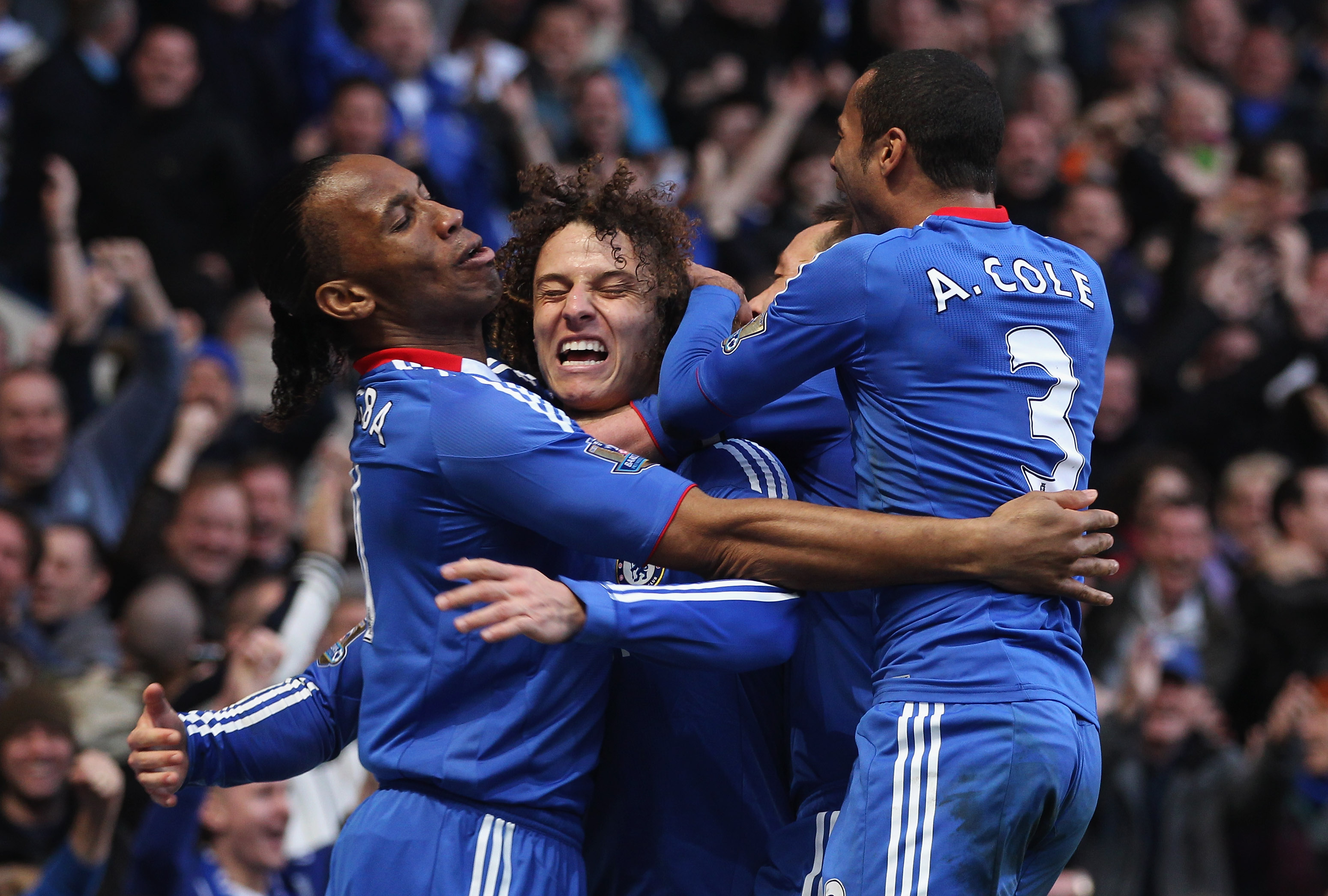LONDON, ENGLAND - MARCH 20:  David Luiz of Chelsea (2L) celebrates with Didier Drogba (L), John Terry (2R) and Ashley Cole (R) as he scores their first goal during the Barclays Premier League match between Chelsea and Manchester City at Stamford Bridge on