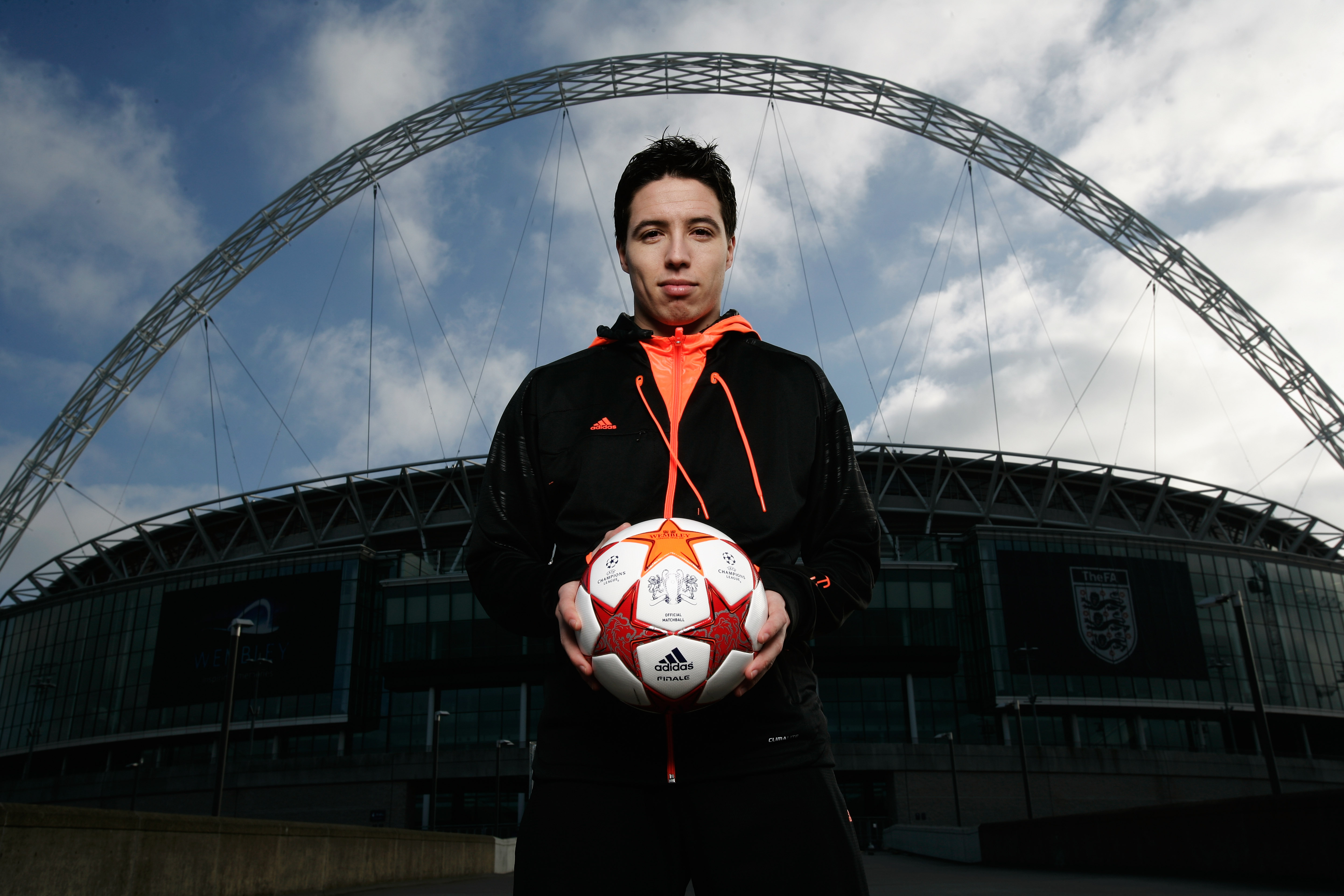LONDON, ENGLAND - MARCH 03:  Samir Nasri of Arsenal is seen under the Wembley arch as adidas present the Official Match Ball for the 2011 UEFA Champions League Final at Wembley Stadium on March 3, 2011 in London, United Kingdom.  (Photo by Gary Prior/Gett