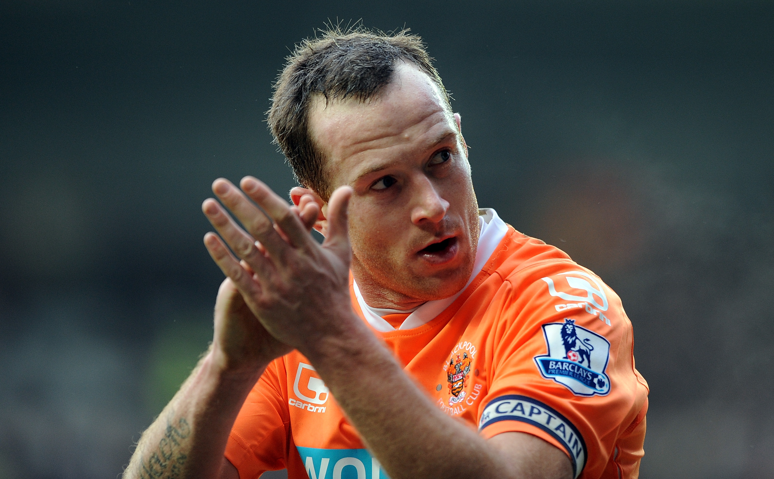 BLACKPOOL, ENGLAND - JANUARY 22:  Charlie Adam of Blackpool applauds the supporters during the Barclays Premier League match between Blackpool and Sunderland at Bloomfield Road on January 22, 2011 in Blackpool, England.  (Photo by Chris Brunskill/Getty Im