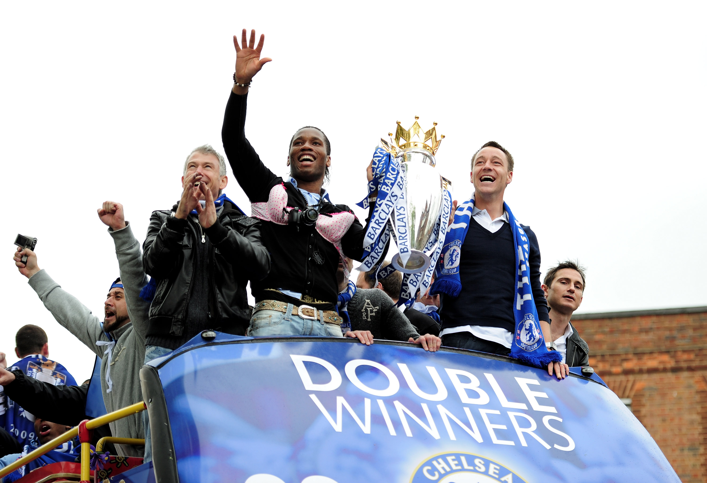 LONDON, ENGLAND - MAY 16:  Chelsea captain John Terry and Didier Drogba celebrate with the Premier League Trophy during the Chelsea FC Victory Parade on May 16, 2010 in London, England.  (Photo by Shaun Botterill/Getty Images)