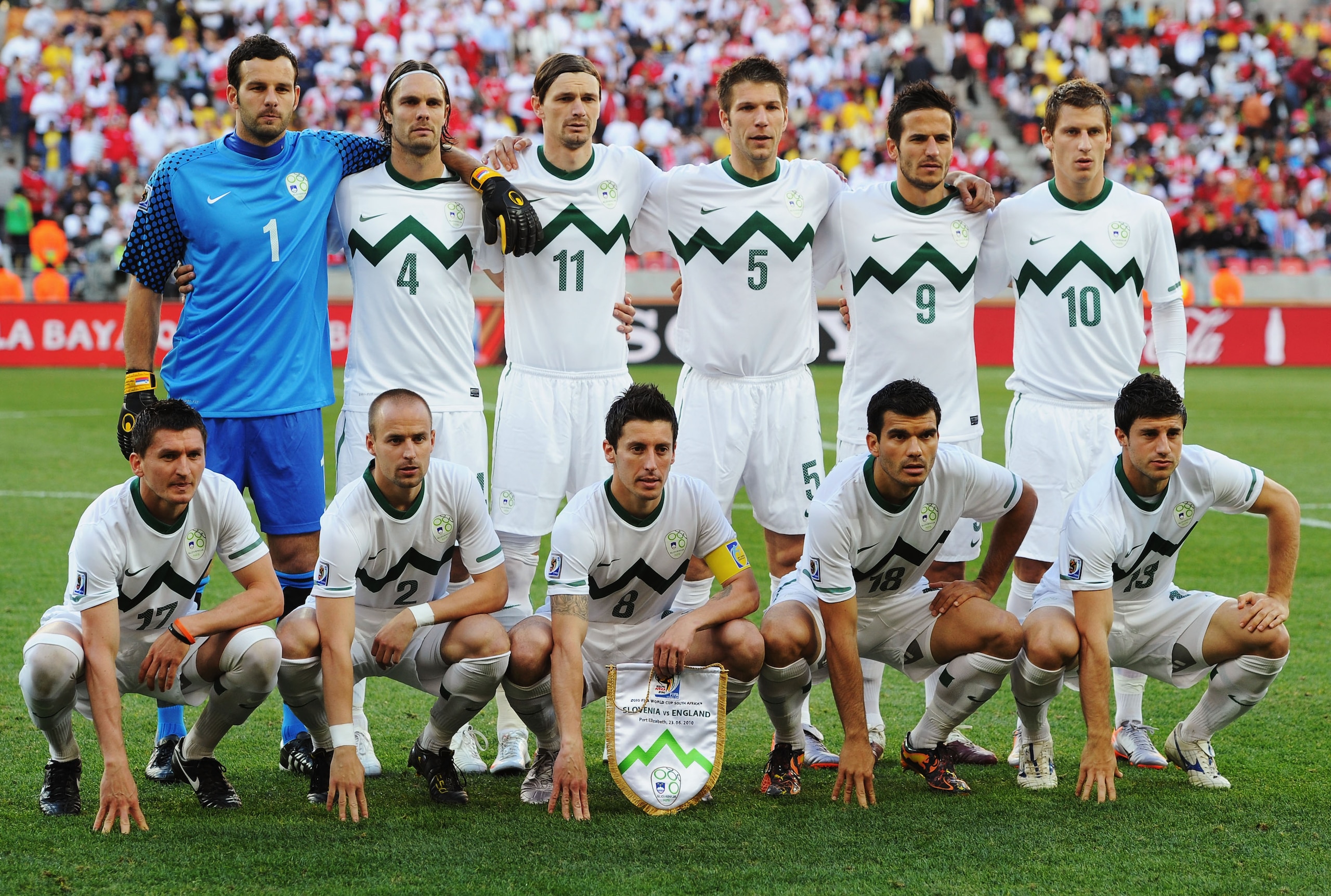 PORT ELIZABETH, SOUTH AFRICA - JUNE 23:  The Slovenia team line up for a group photo before the 2010 FIFA World Cup South Africa Group C match between Slovenia and England at the Nelson Mandela Bay Stadium on June 23, 2010 in Port Elizabeth, South Africa.