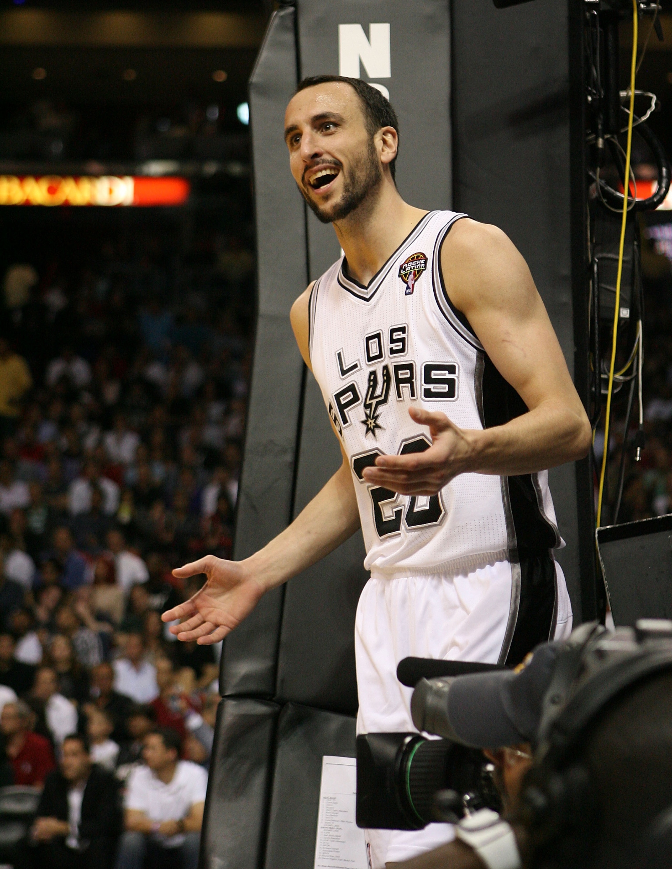 MIAMI - MARCH 14:  Forward Manu Ginobili #20 of the San Antonio Spurs complains to the referee against the Miami Heat at American Airlines Arena on March 14, 2011 in Miami, Florida. NOTE TO USER: User expressly acknowledges and agrees that, by downloading