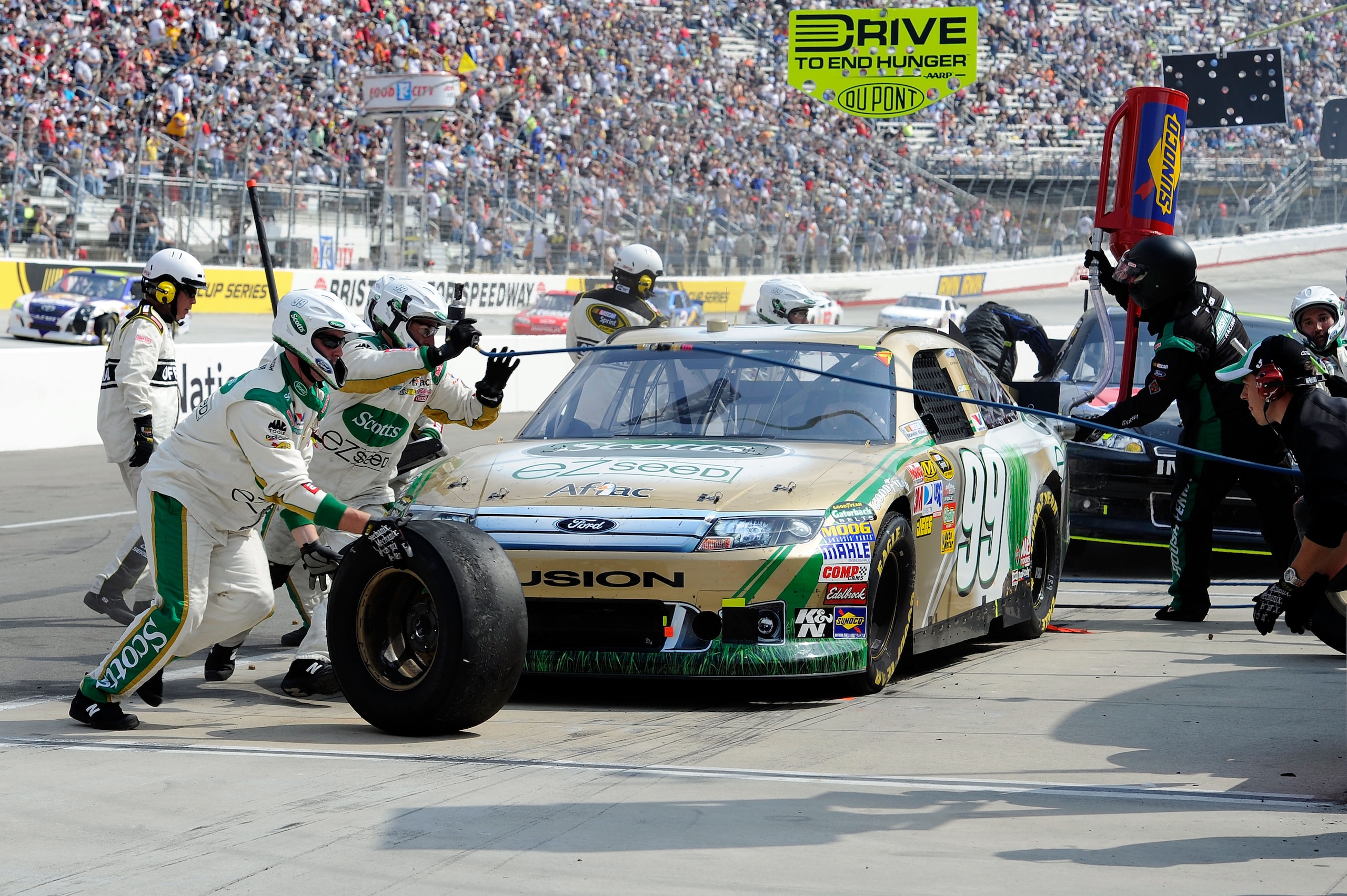 BRISTOL, TN - MARCH 20:  Carl Edwards, driver of the #99 Scotts EZ Seed Ford, pits during the NASCAR Sprint Cup Series Jeff Byrd 500 Presented By Food City at Bristol Motor Speedway on March 20, 2011 in Bristol, Tennessee.  (Photo by John Harrelson/Getty